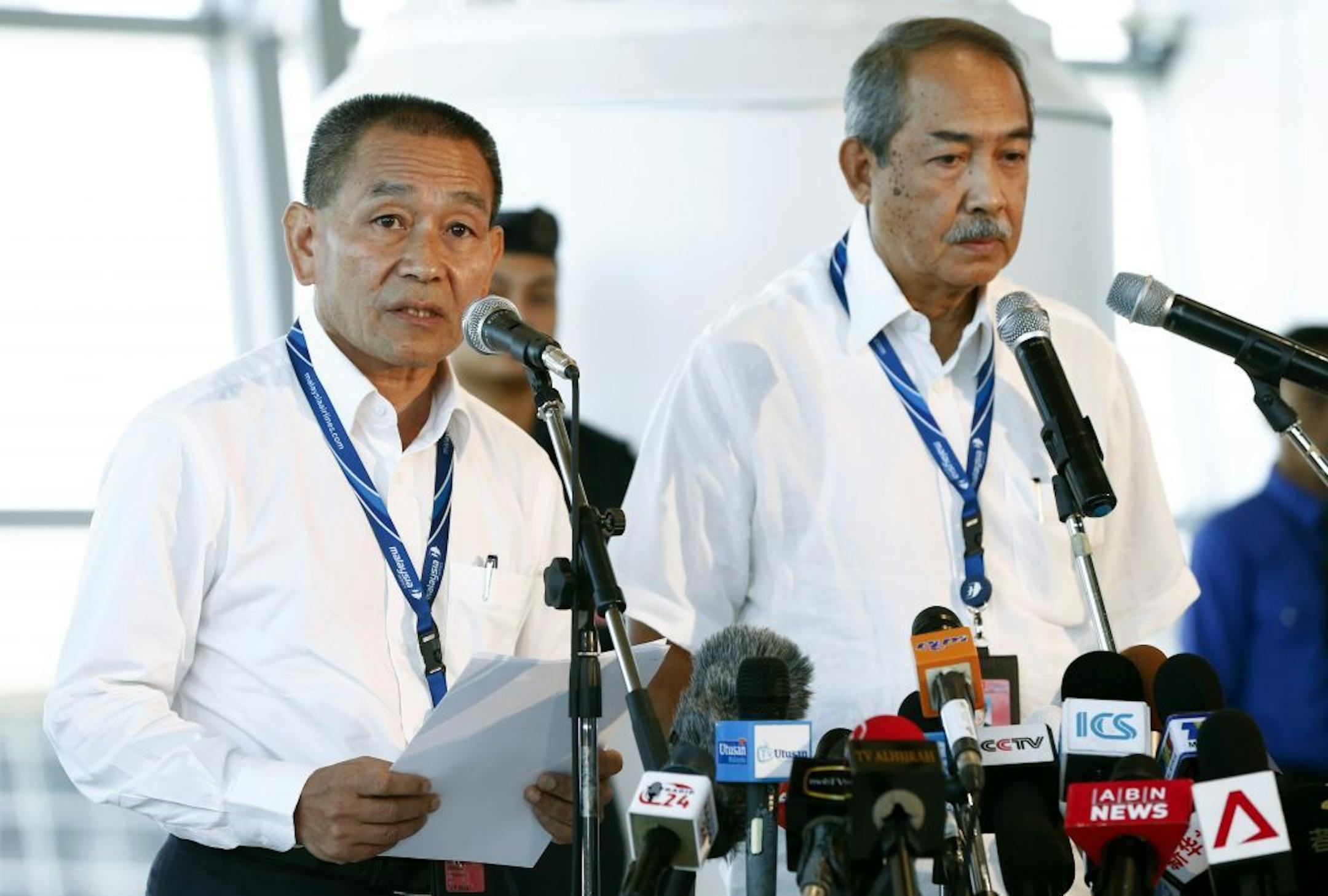 Malaysia Airlines Group CEO Ahmad Jauhari Yahya, left, speaks during a press conference as Nor Yusof, chairman of Malaysia Airlines listens at Kuala Lumpur International Airport in Sepang, Malaysia, Tuesday, March 25, 2014. China demanded Tuesday that Malaysia turn over satellite data used to conclude that a Malaysia Airlines passenger jet was lost in the southern Indian Ocean with no survivors during a flight to Beijing.
