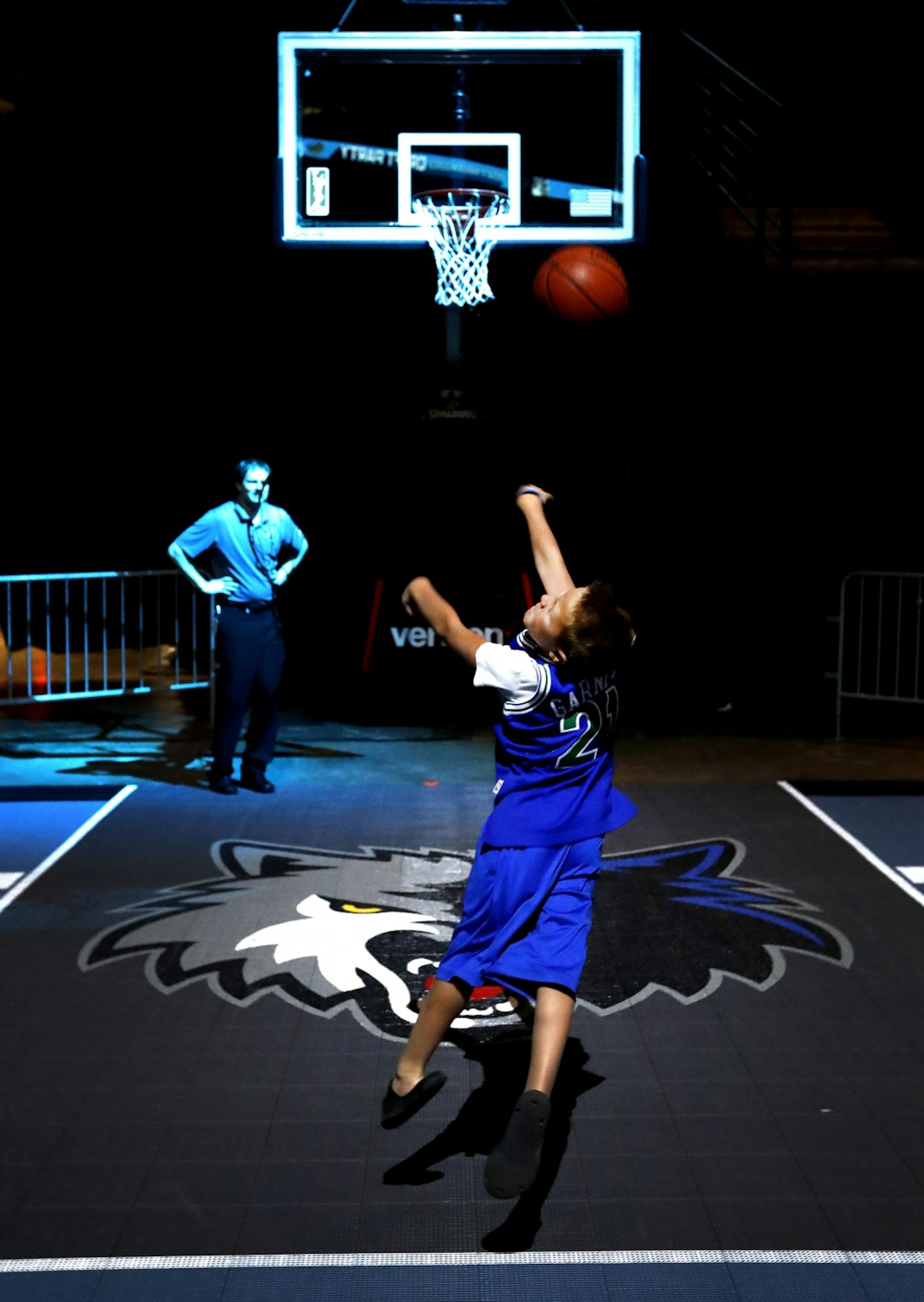 Landyn Kosky, 8, of Storm Lake, IA attempted a shot at the Timberwolves draft party.
