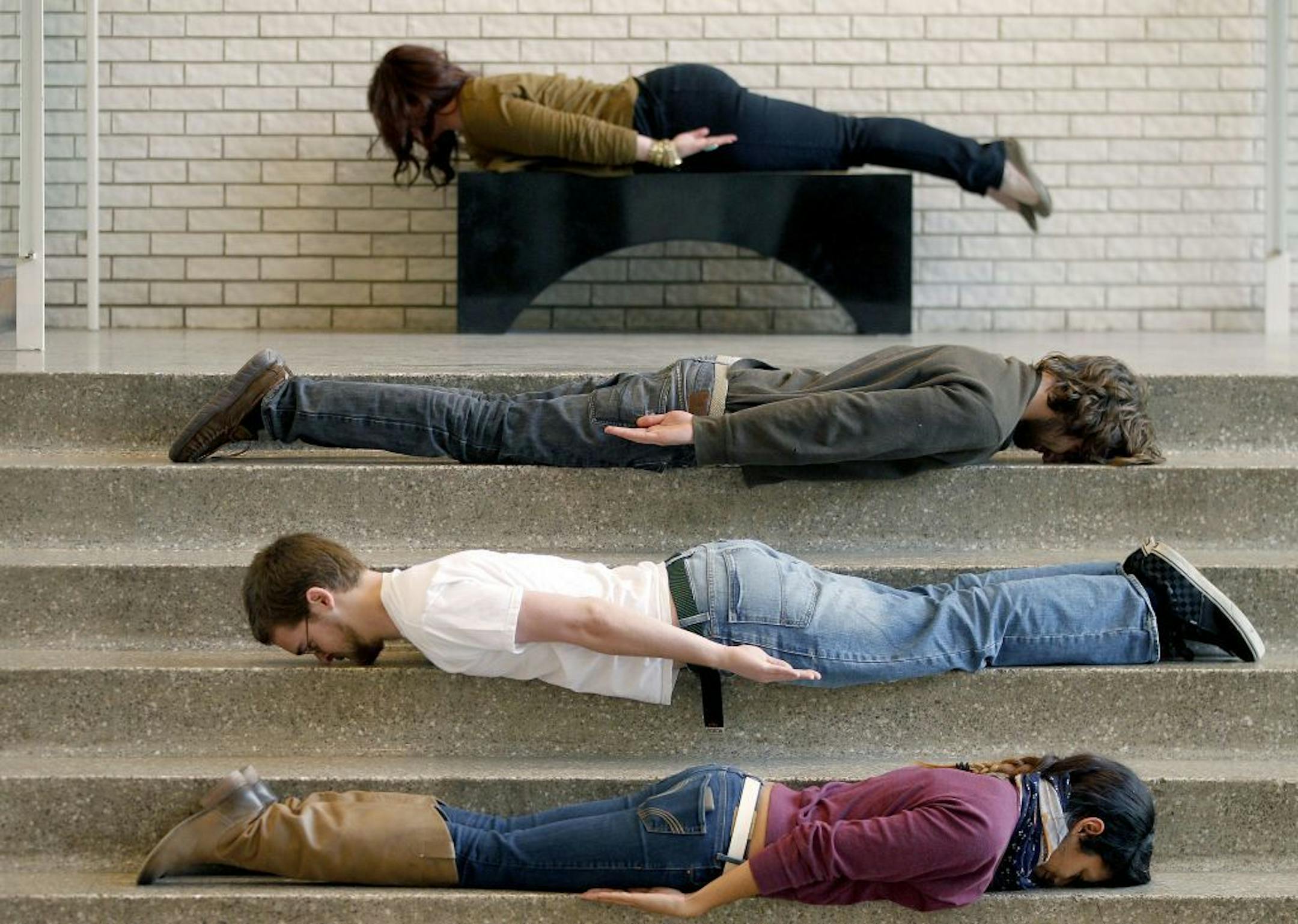 "The Year in Stunt-Photo Fads," "The Year in Stunt-Photo Fads," Olivia Rodriguez, purple sweater, Carl Thompson, glasses, Chris Moser, and Molly May, Planking.