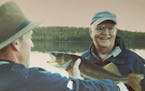 Walter Mondale, with longtime friend and current St. Louis County Sheriff Ross Litman, was an avid fisherman who traveled to Alaska to fish for salmon