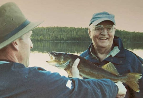 Walter Mondale, with longtime friend and current St. Louis County Sheriff Ross Litman, was an avid fisherman who traveled to Alaska to fish for salmon