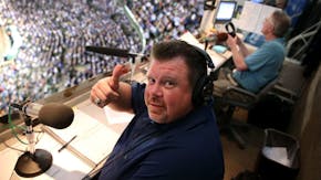 Cubs radio broadcaster Ron Coomer gives a "thumbs up" while working a game alongside Pat Hughes at Wrigley Field on Sept. 15, 2016. (Chris Sweda / Chi