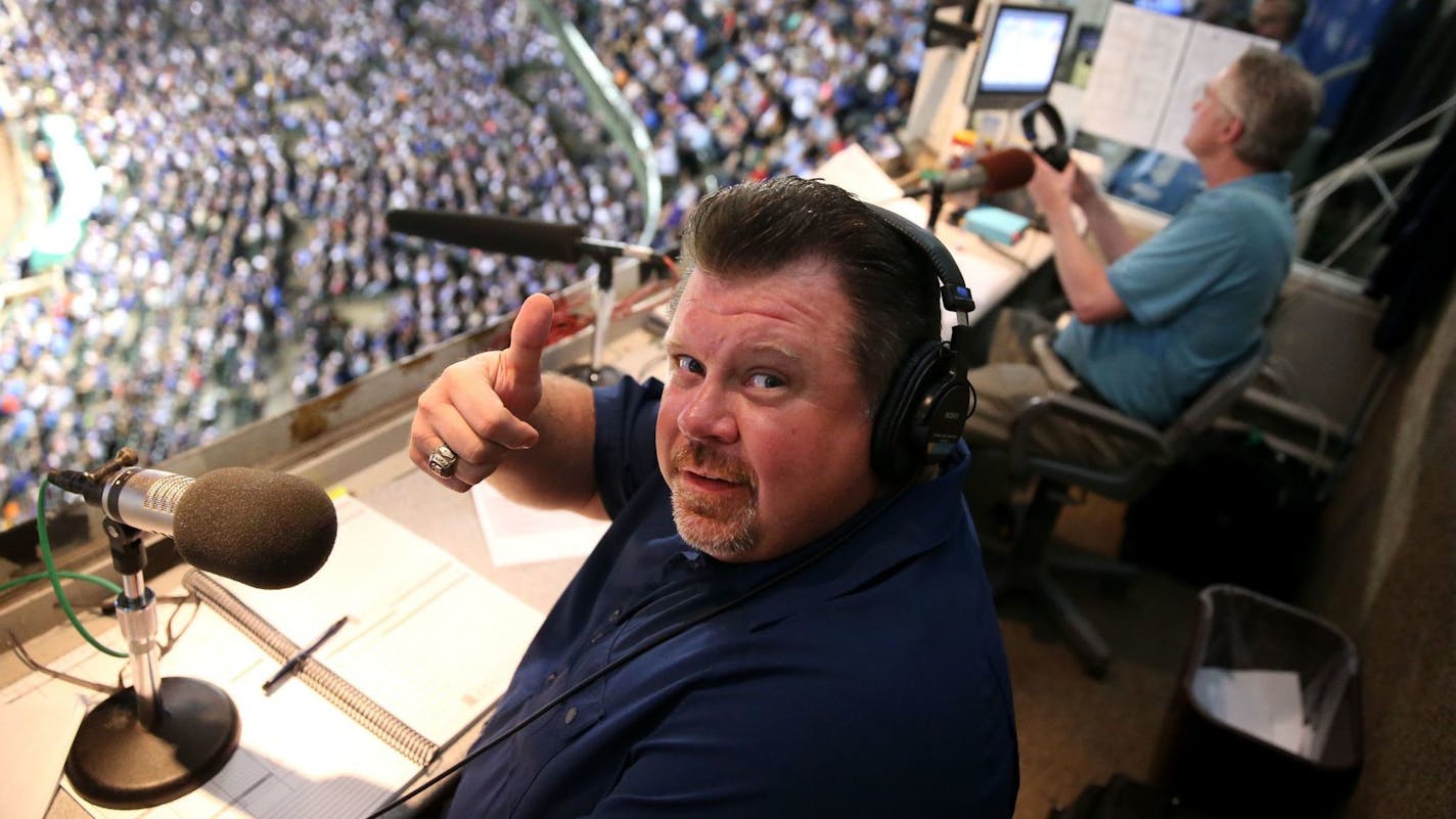 Cubs radio broadcaster Ron Coomer gives a "thumbs up" while working a game alongside Pat Hughes at Wrigley Field on Sept. 15, 2016. (Chris Sweda / Chicago Tribune)