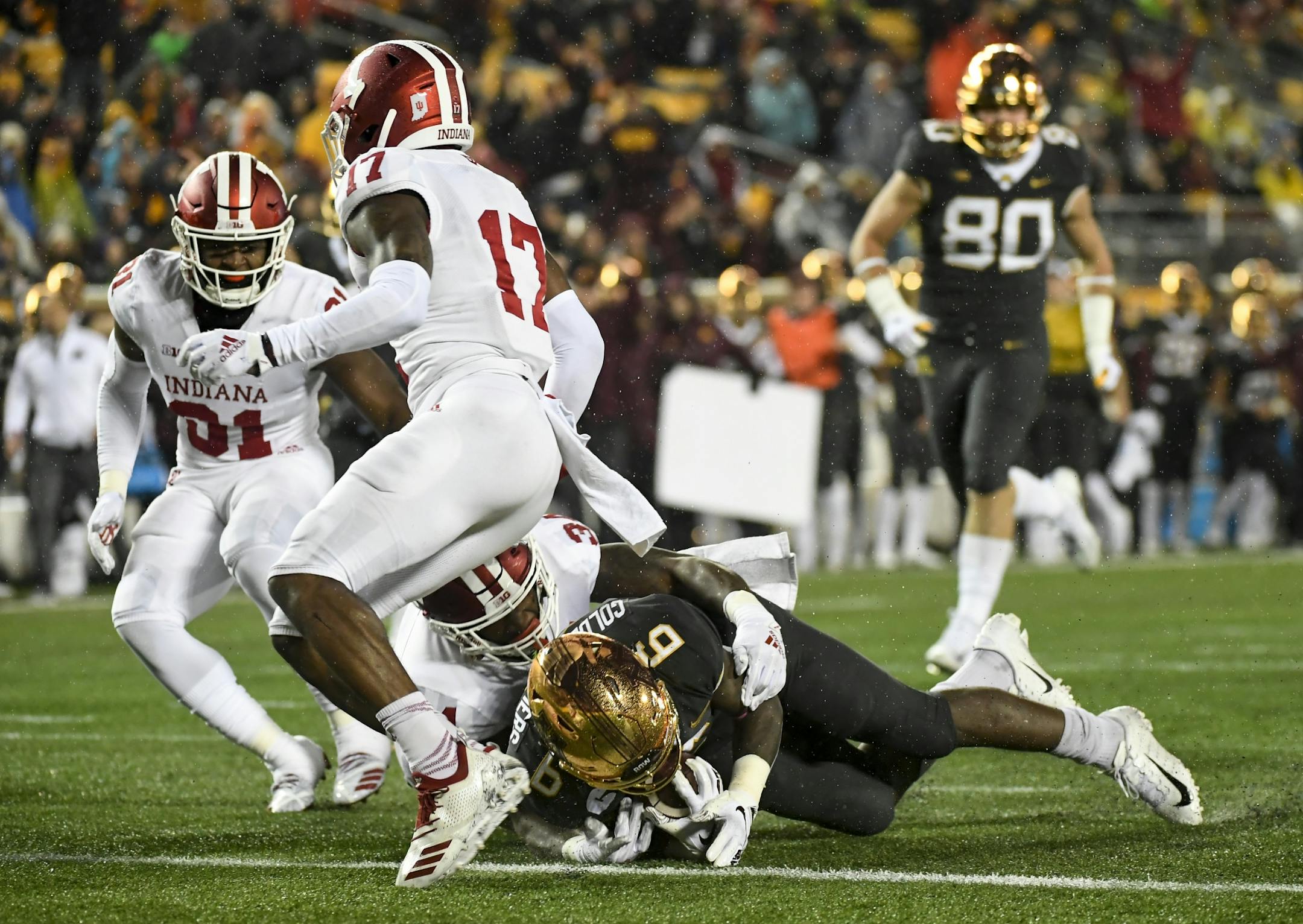Gophers wide receiver Tyler Johnson (6) fell into the end zone for his second touchdown of the night against the Indiana Hoosiers.