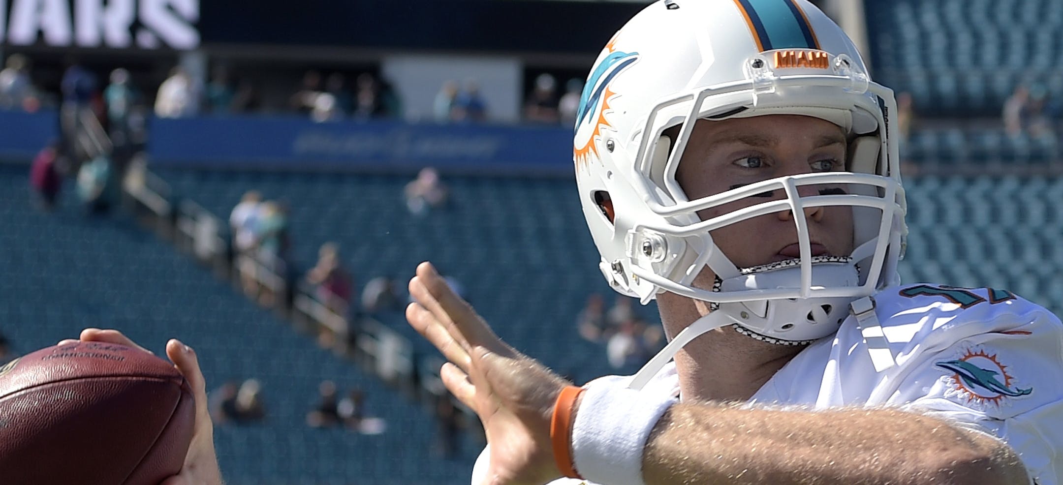 Miami Dolphins quarterback Ryan Tannehill (17) throws during warmups before an NFL football game against the Jacksonville Jaguars in Jacksonville, Fla., Sunday, Oct. 26, 2014.(AP Photo/Phelan M. Ebenhack)