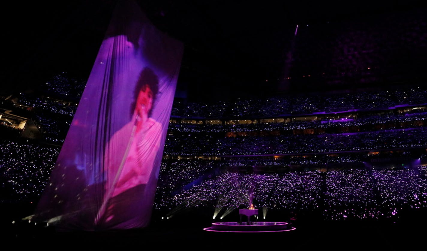 Accompanied by a huge video projection of Prince in "Purple Rain," Justin Timberlake sang "I Would Die 4 U" during the halftime show at Super Bowl LII at U.S. Bank Stadium in Minneapolis.