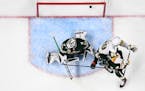 A Vegas Golden Knights shot made it past Minnesota Wild goaltender Cam Talbot (33), but the goal was waved off due to goaltender interference.