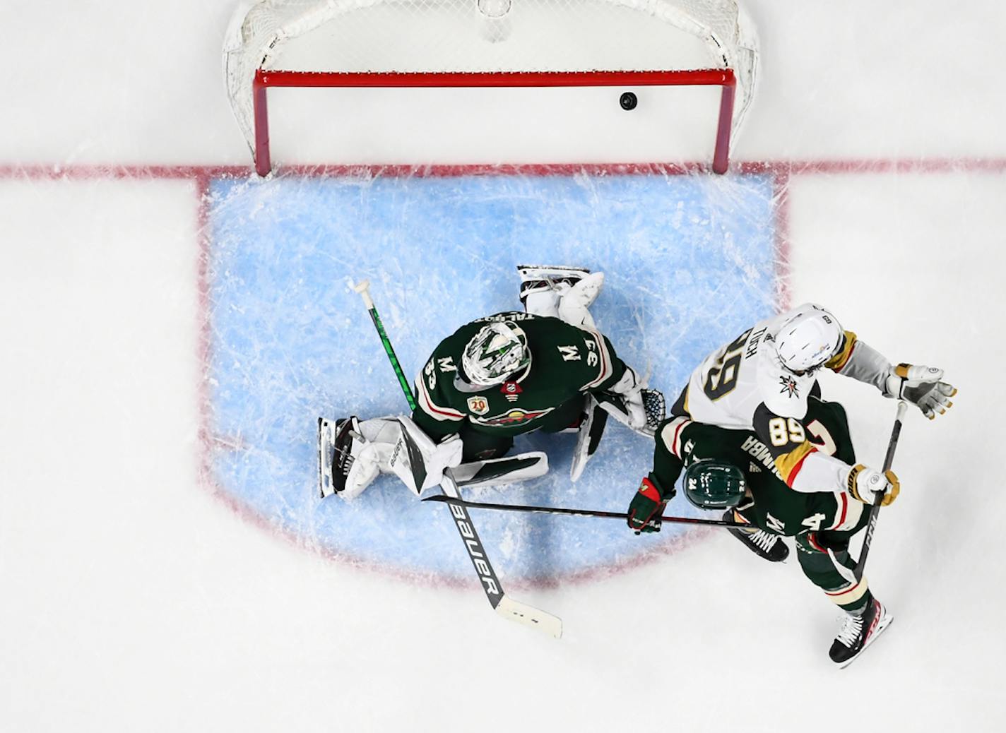 A Vegas Golden Knights shot made it past Minnesota Wild goaltender Cam Talbot (33), but the goal was waved off due to goaltender interference.