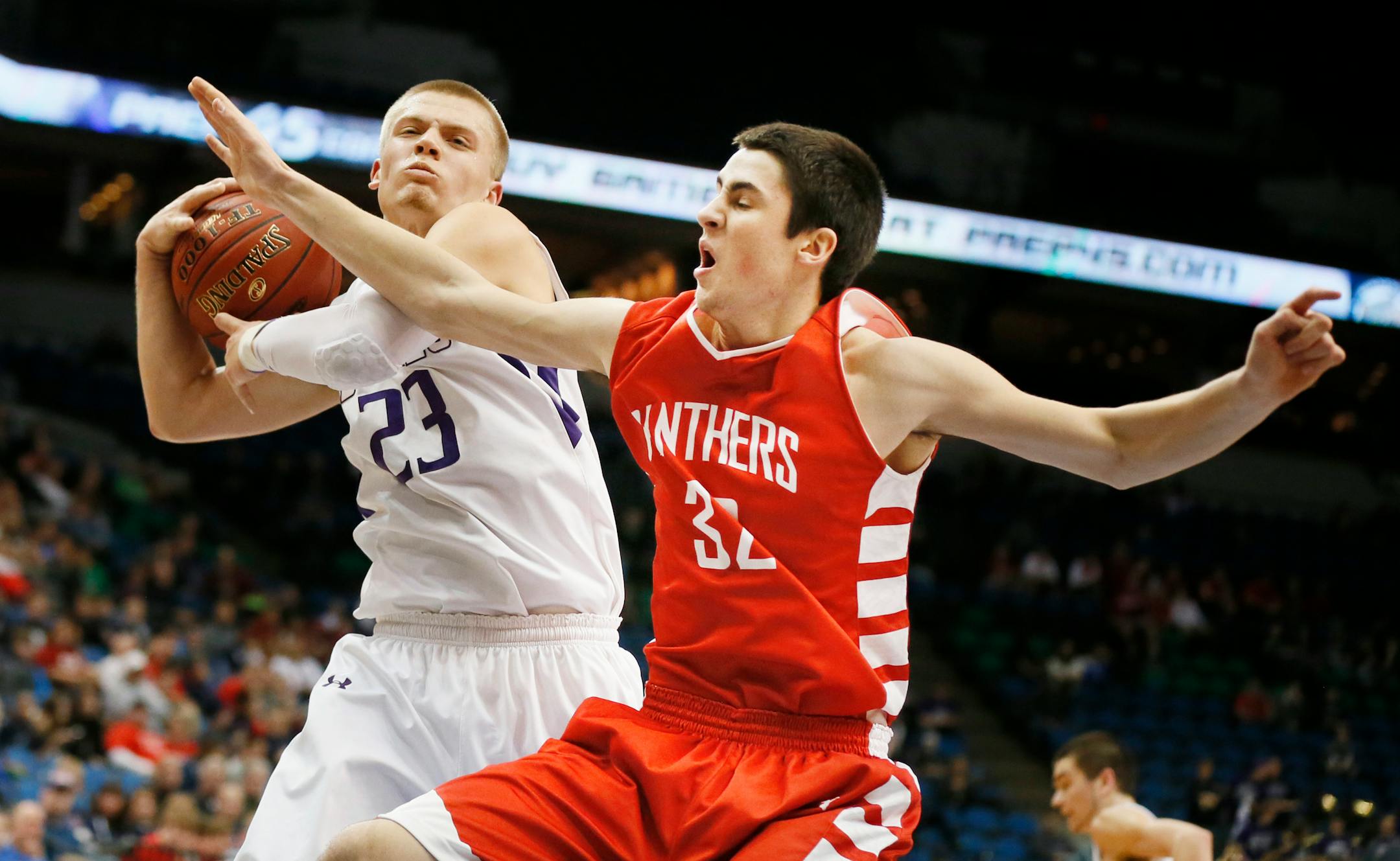 Buffalo's Zach Daiker pulled down a rebound over Drew Stewart during class 4A quarterfinals in 2014.