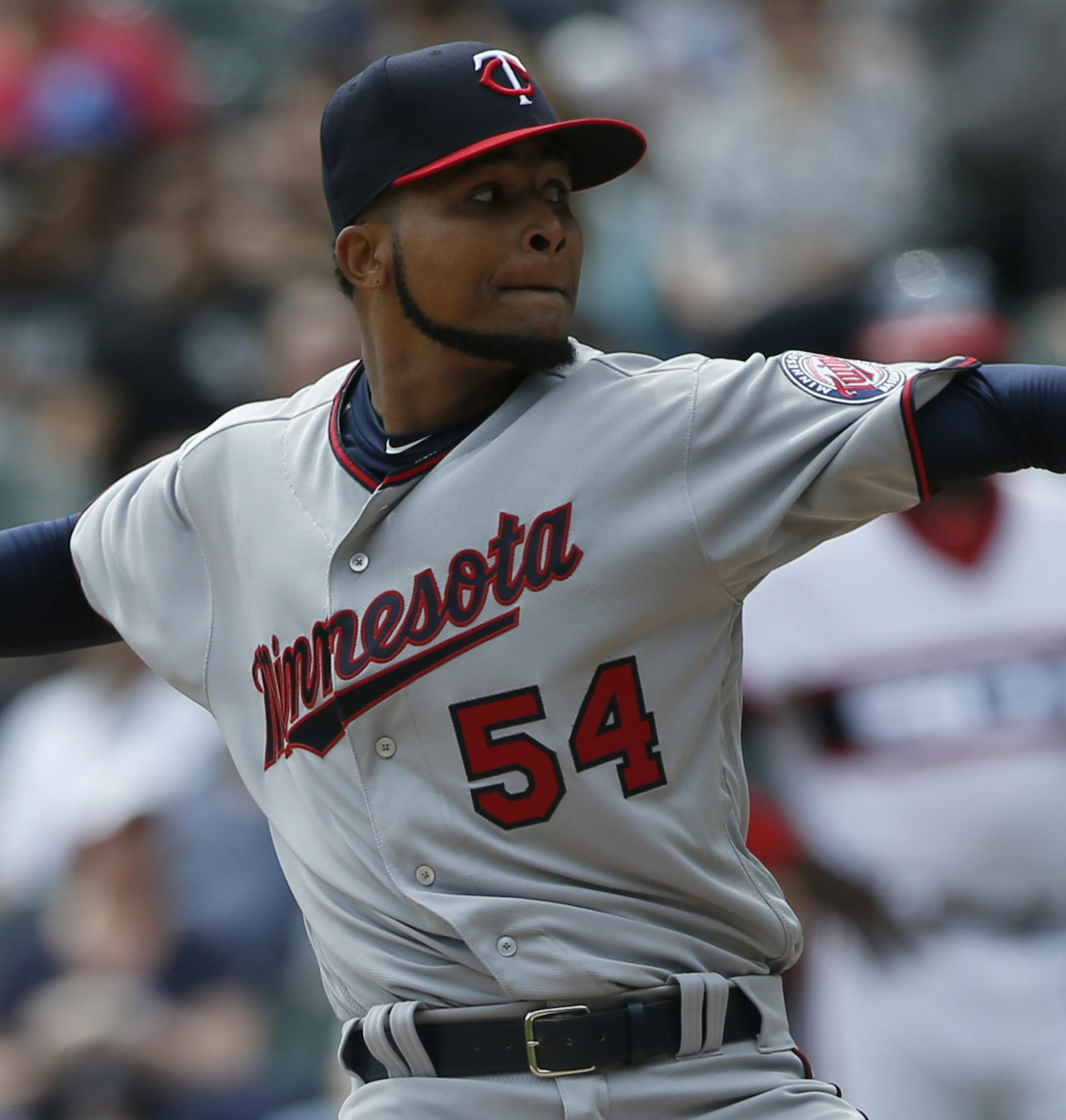 Minnesota Twins starting pitcher Ervin Santana throws against the Chicago White Sox during the first inning of a baseball game Sunday, April 9, 2017, in Chicago. (AP Photo/Nam Y. Huh)