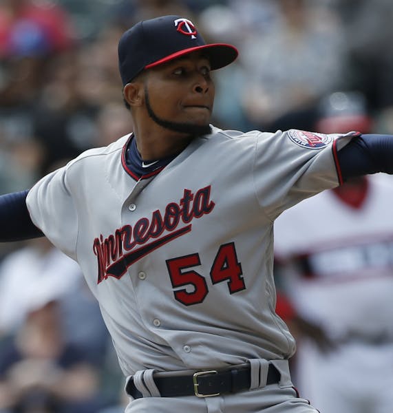 Minnesota Twins starting pitcher Ervin Santana throws against the Chicago White Sox during the first inning of a baseball game Sunday, April 9, 2017, 