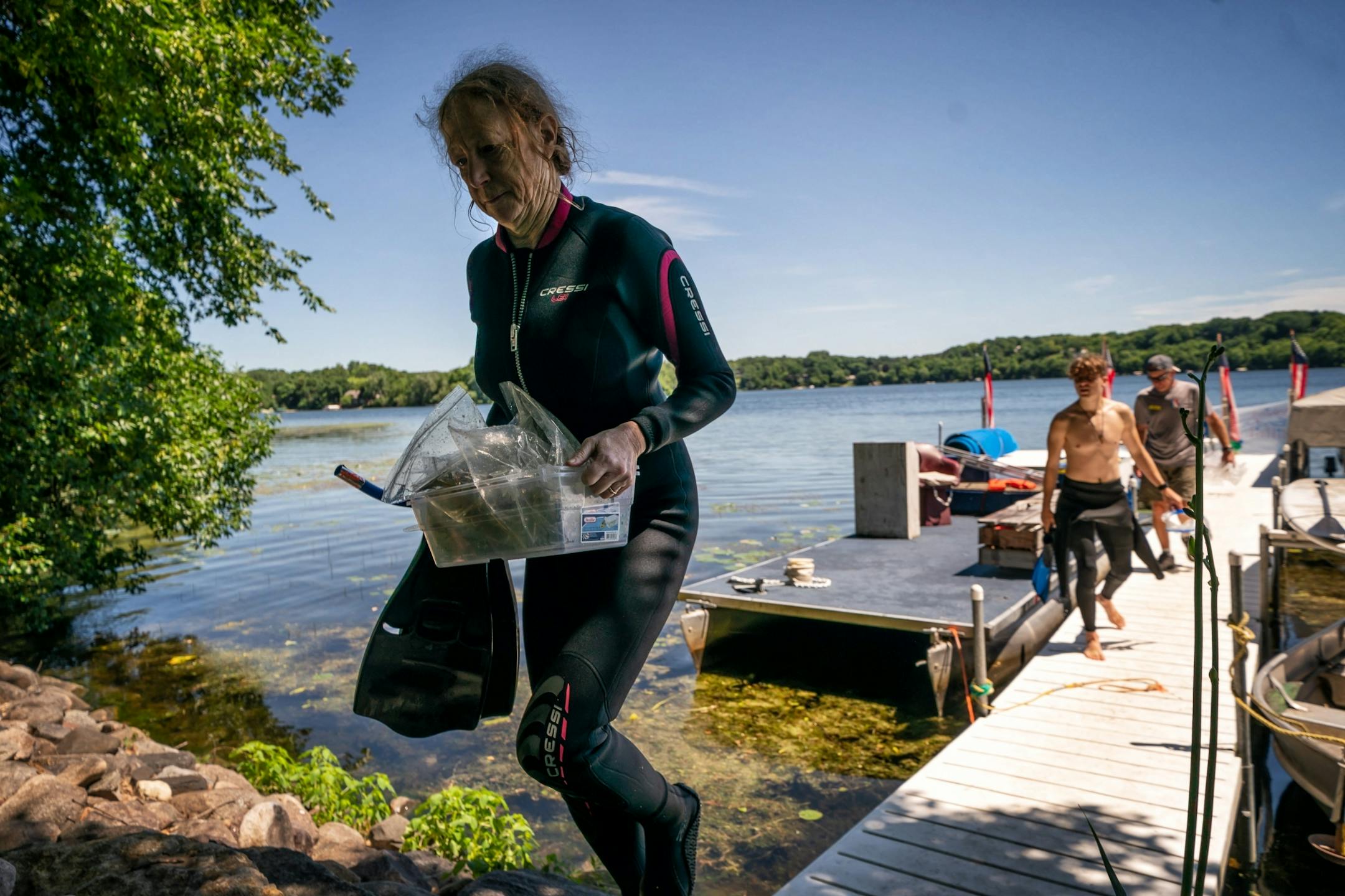 Professor Sallie Sheldon returned with milfoil plants containing adult weevils that will be used for breeding in the lab.