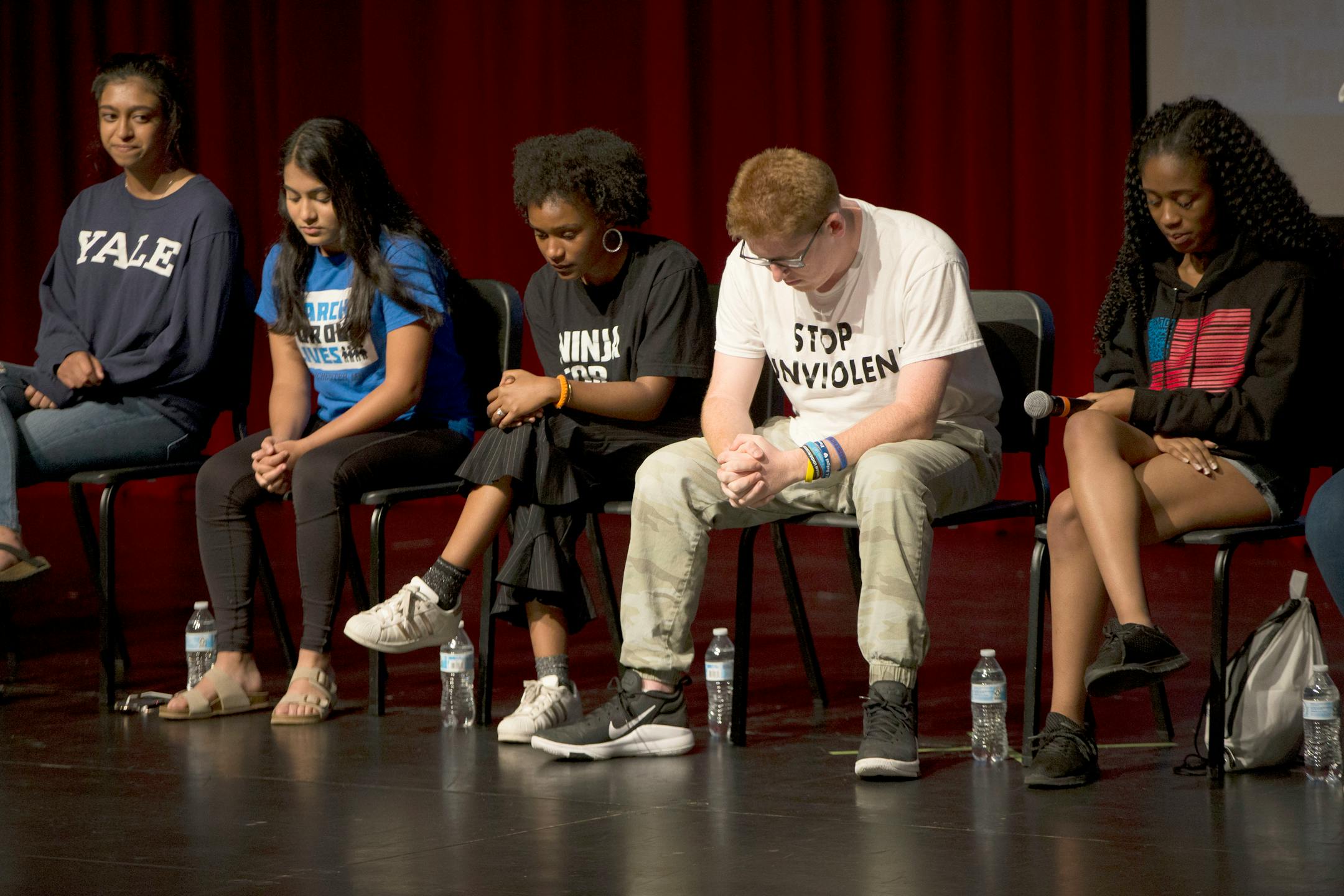 Students begin the panel with a moment of silence for Thurman J. Blevins who died on Saturday evening after being shot by Minneapolis police.