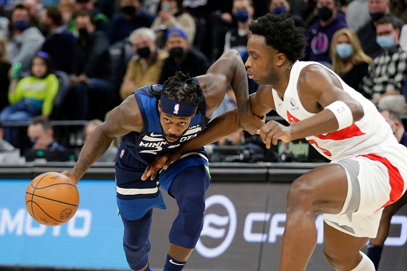 Timberwolves guard Patrick Beverley drives on Toronto forward OG Anunoby during the first half Wednesday