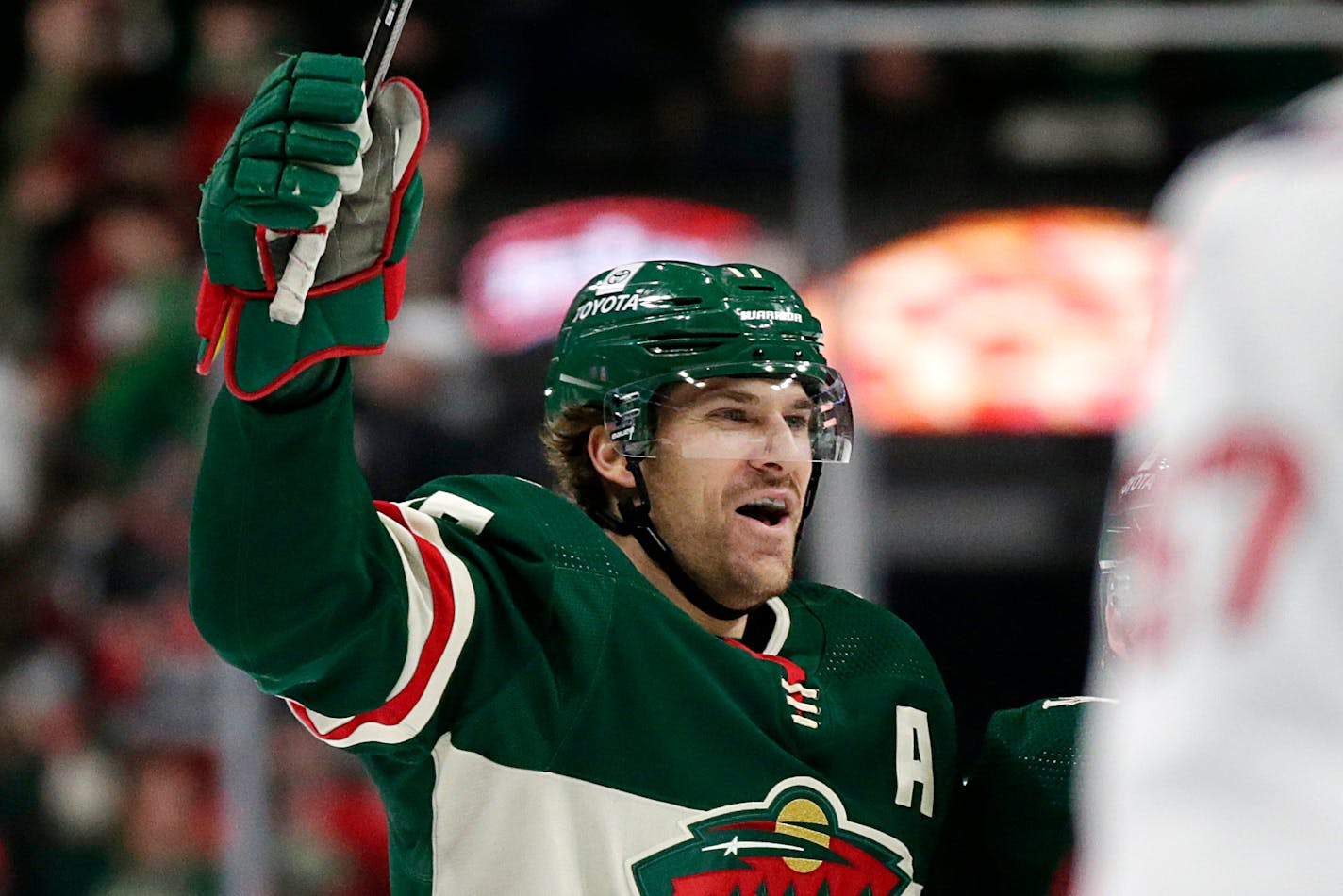 Minnesota Wild left wing Marcus Foligno celebrates his empty-net goal against the Washington Capitals during the second period of an NHL hockey game Saturday, Jan. 8, 2022, in St, Paul, Minn. (AP Photo/Andy Clayton-King)