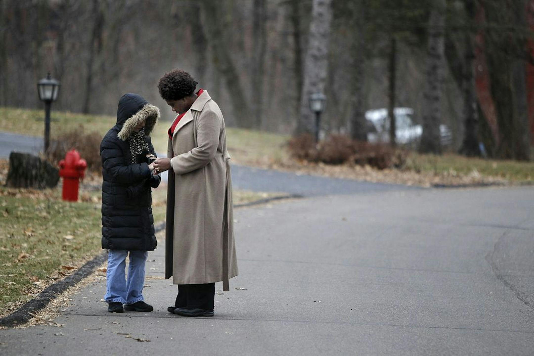 Mary McCarten, the home director at Gianni Homes, went for a walk with one of its residents, Friday, Decembeer 7, 2012 in Minnetonka, MN. Gianni Homes is a memory care facility that sits in a residential area. (ELIZABETH FLORES/STAR TRIBUNE) ELIZABETH FLORES � eflores@startribune.com