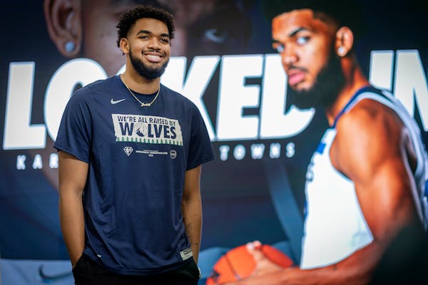 Karl Anthony Towns talked to reporters at a news conference Friday at the Courts at Mayo Clinic Square in Minneapolis.
