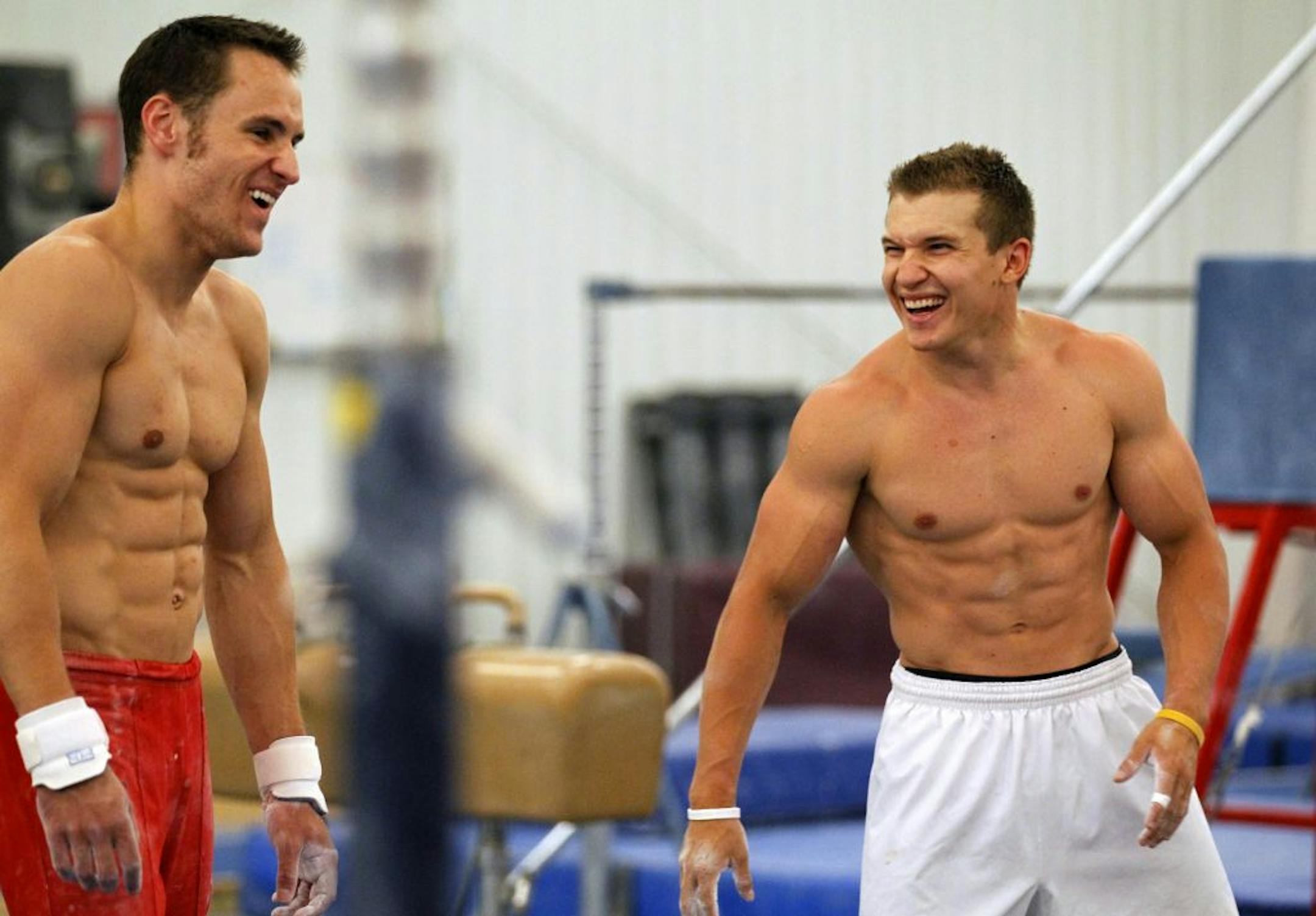 Olympic medalist Jonathan Horton, right, joked with Spencer Johnson while practicing at Cypress Academy Gym in Houston Texas this summer.
