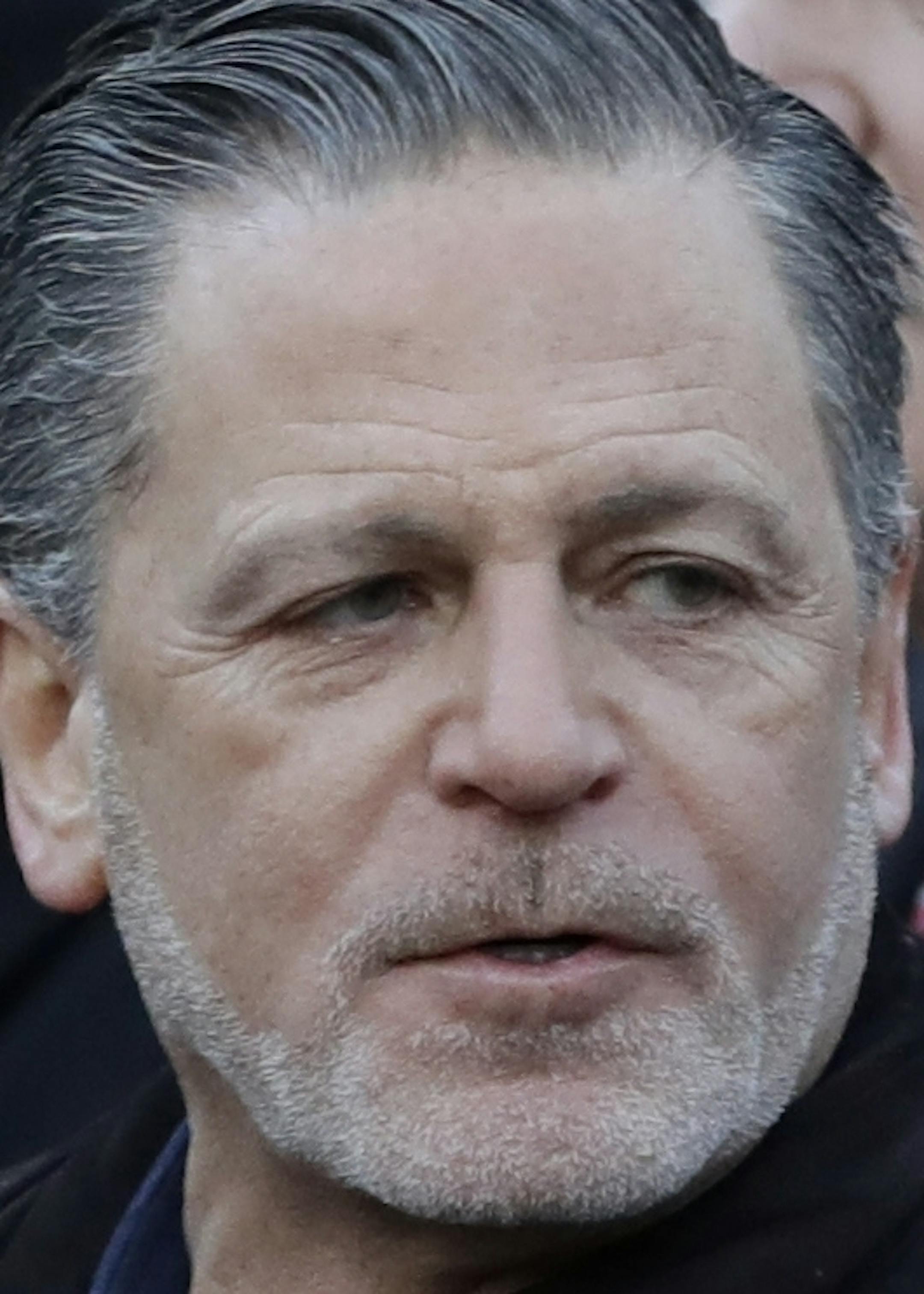 Quicken Loans founder Dan Gilbert, left, meets with Detroit Mayor Mike Duggan at the former site of the J.L. Hudson Co. department store, Thursday, Dec. 14, 2017, in Detroit. Ground was broken for a new 800-foot-tall, $900 million two-building project that will include a 58-story residential tower and 12-floor building for retail and conference space. The tower will have an 800-foot-tall (244-meter) sky deck. (AP Photo/Carlos Osorio)