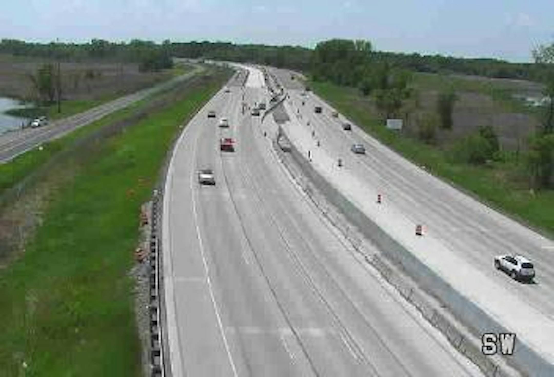 A MnDOT camera shows motorists making their way through the construction zone on I-35 near Forest Lake, Minn.