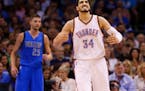 Oklahoma City Thunder center Enes Kanter (34) reacts after being fouled in the first quarter of an NBA basketball game against the Dallas Mavericks in