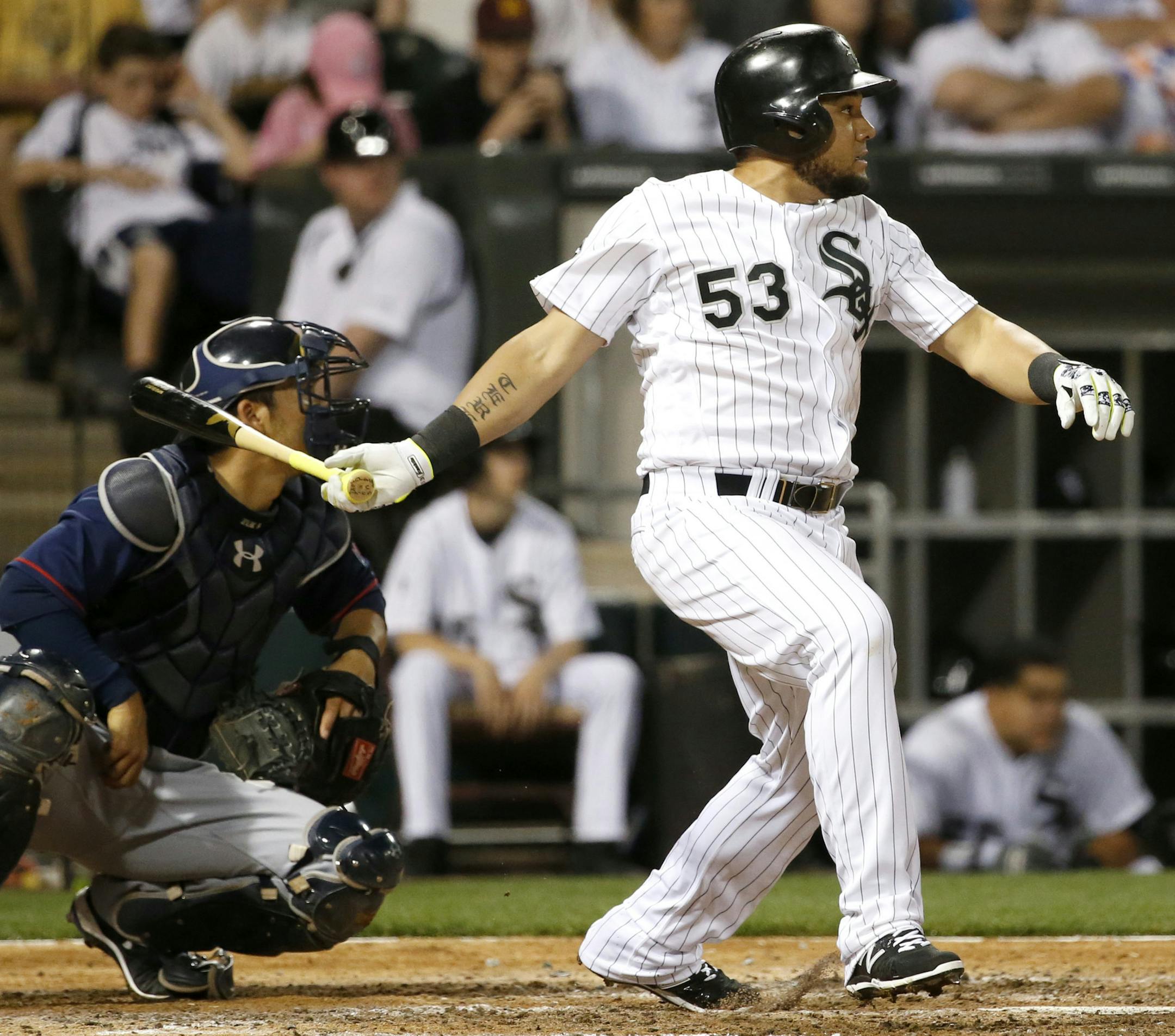 Chicago White Sox's Melky Cabrera watches his RBI single off Minnesota Twins starting pitcher Ricky Nolasco, scoring Austin Jackson, during the fifth inning of a baseball game Friday, May 6, 2016, in Chicago. (AP Photo/Charles Rex Arbogast)