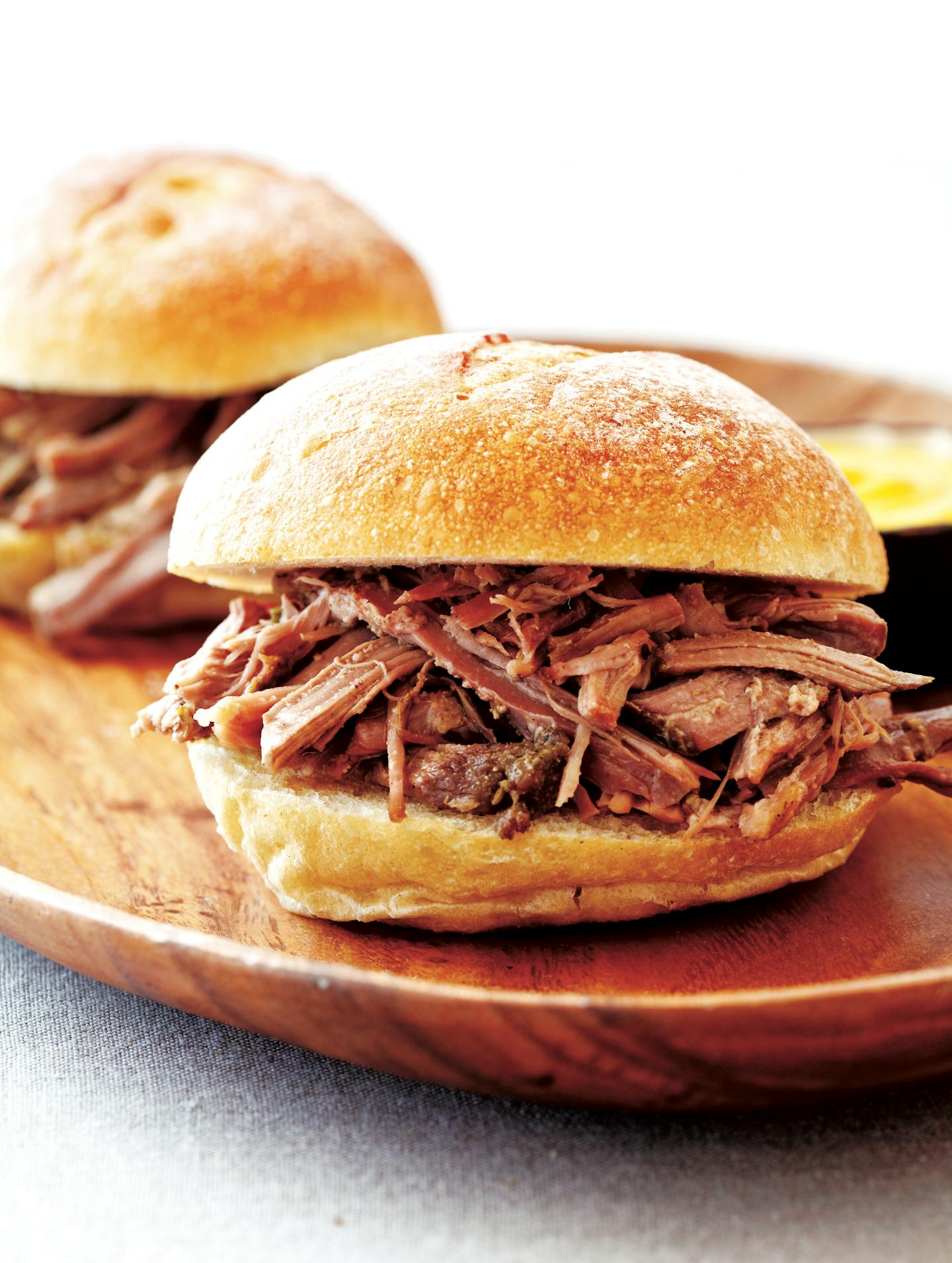 Iron Range Porketta Sandwiches from "Big Flavors from Italian America" by Cook's Country ORG XMIT: 1003229