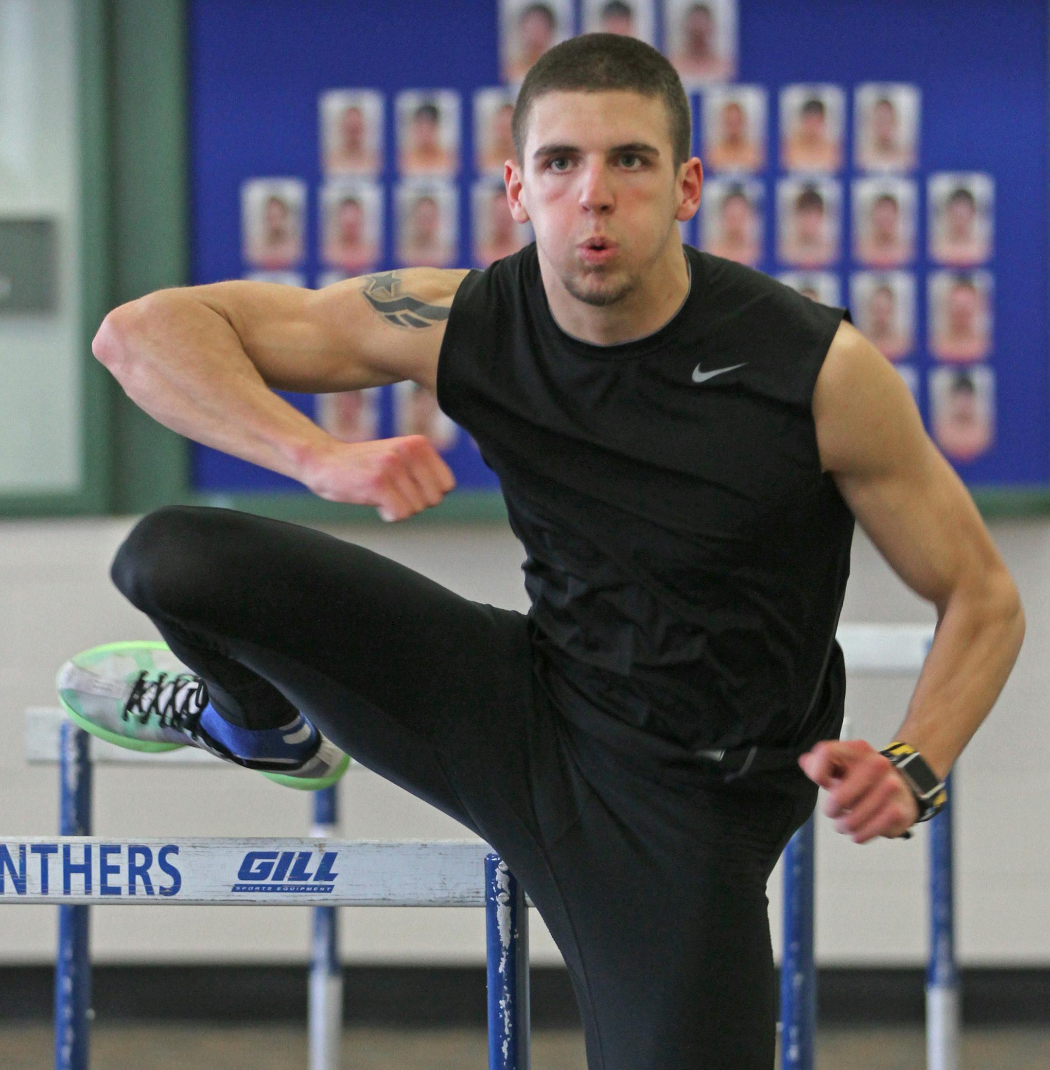 CJ Janu, Spring Lake Park High track member, practiced drills on the hurdles during indoor practice at the school. Photographed on 3/26/13.] Bruce Bisping/star tribune bbisping@startribune.com CJ Janu/source.