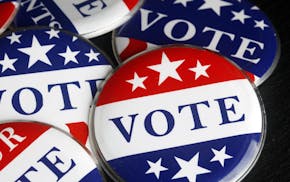 iStock
Red, white, and blue vote buttons.