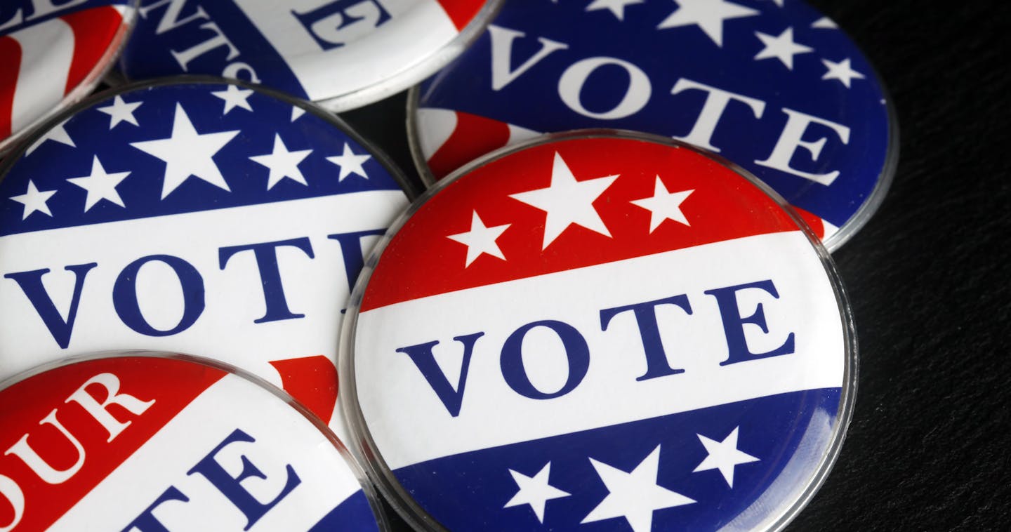 iStock
Red, white, and blue vote buttons.