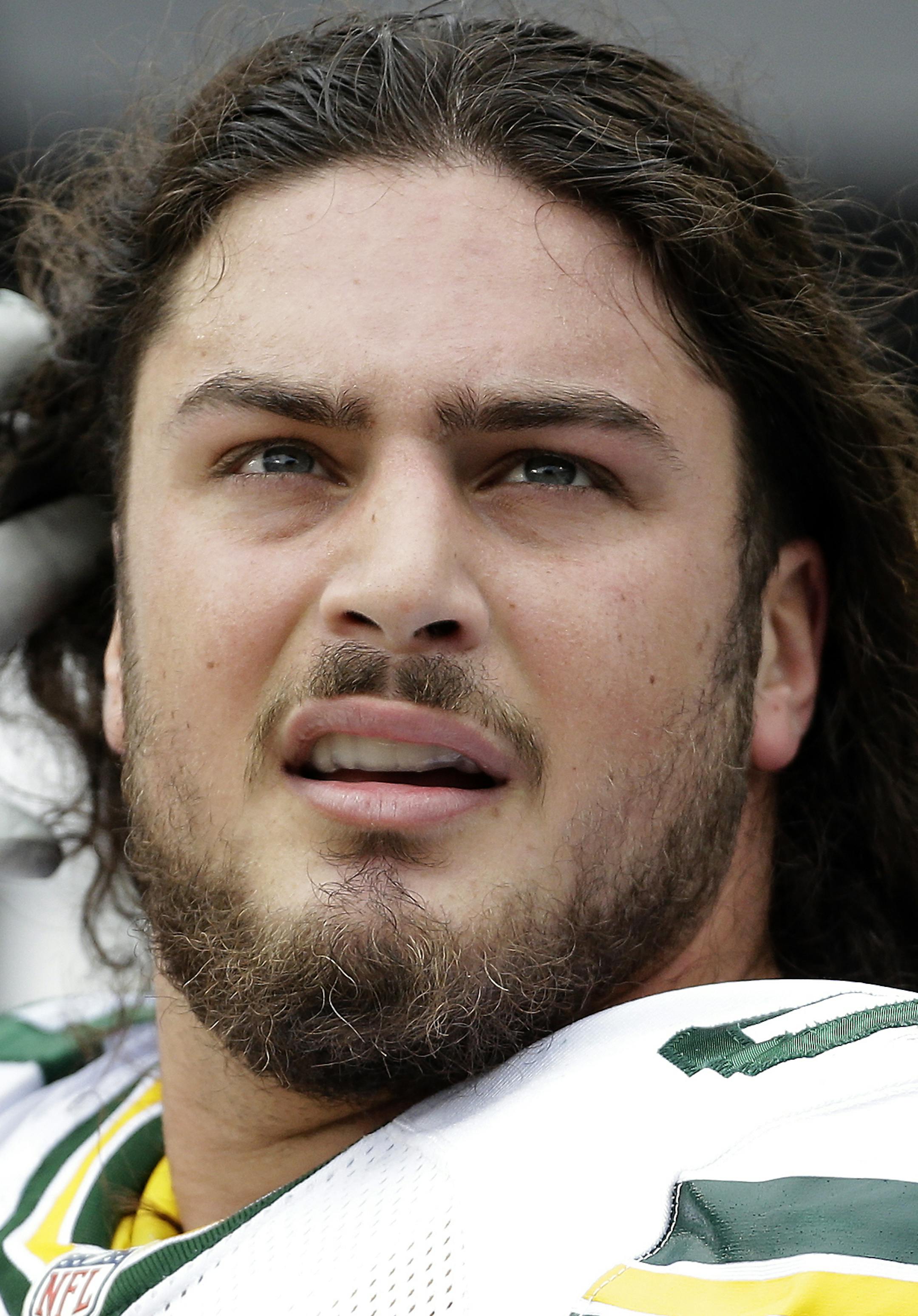 Green Bay Packers' David Bakhtiari (69) on the sidelines against the Carolina Panthers during the first half of an NFL football game in Charlotte, N.C., Sunday, Nov. 8, 2015. The Panthers won 37-29. (AP Photo/Bob Leverone) ORG XMIT: OTKBL178