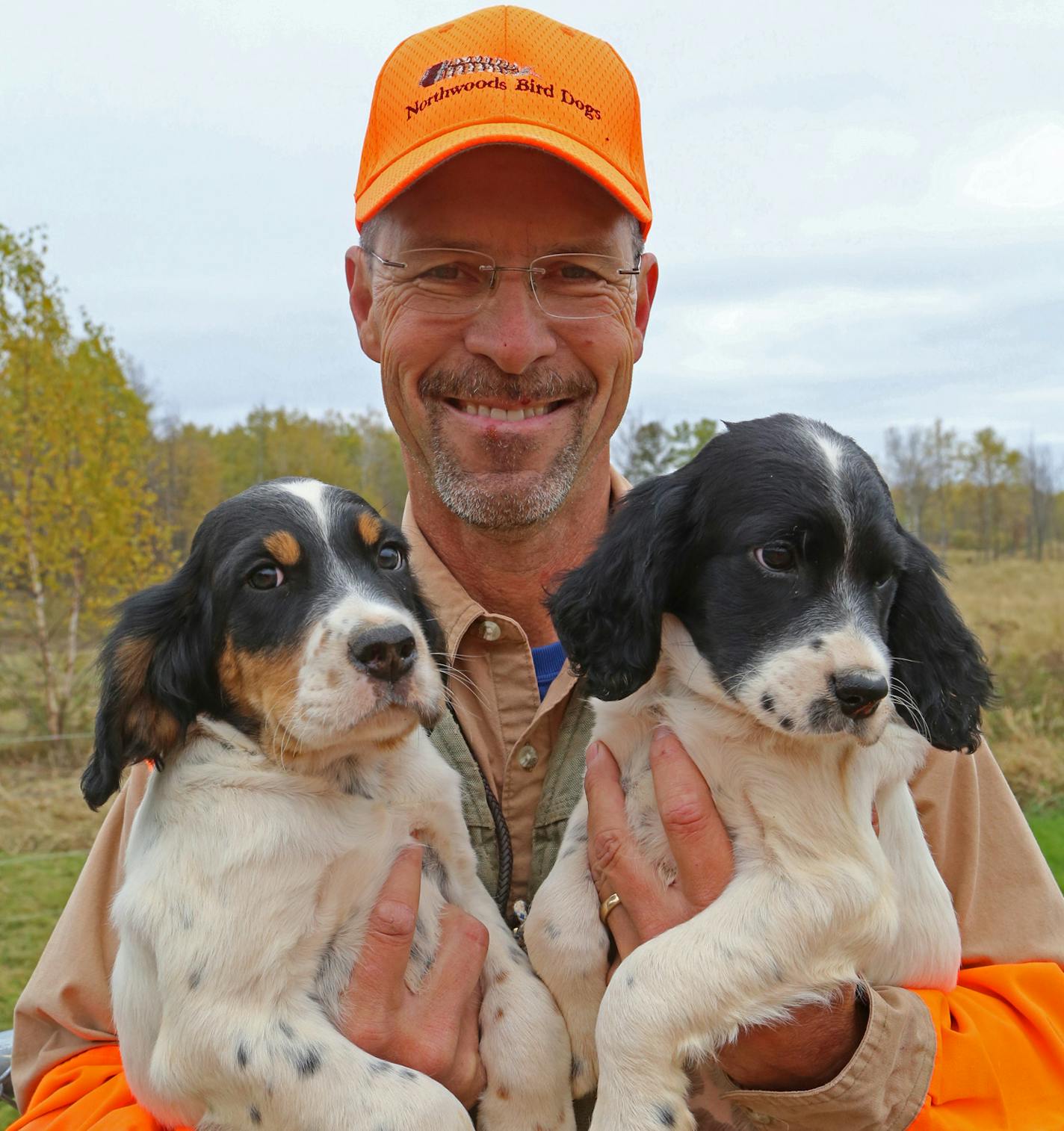 Jerry Kolter&#x2019;s affection for a pair of young English setters was apparent in his smile &#x2014; though the puppies appeared a little worried by the guy taking their photograph.