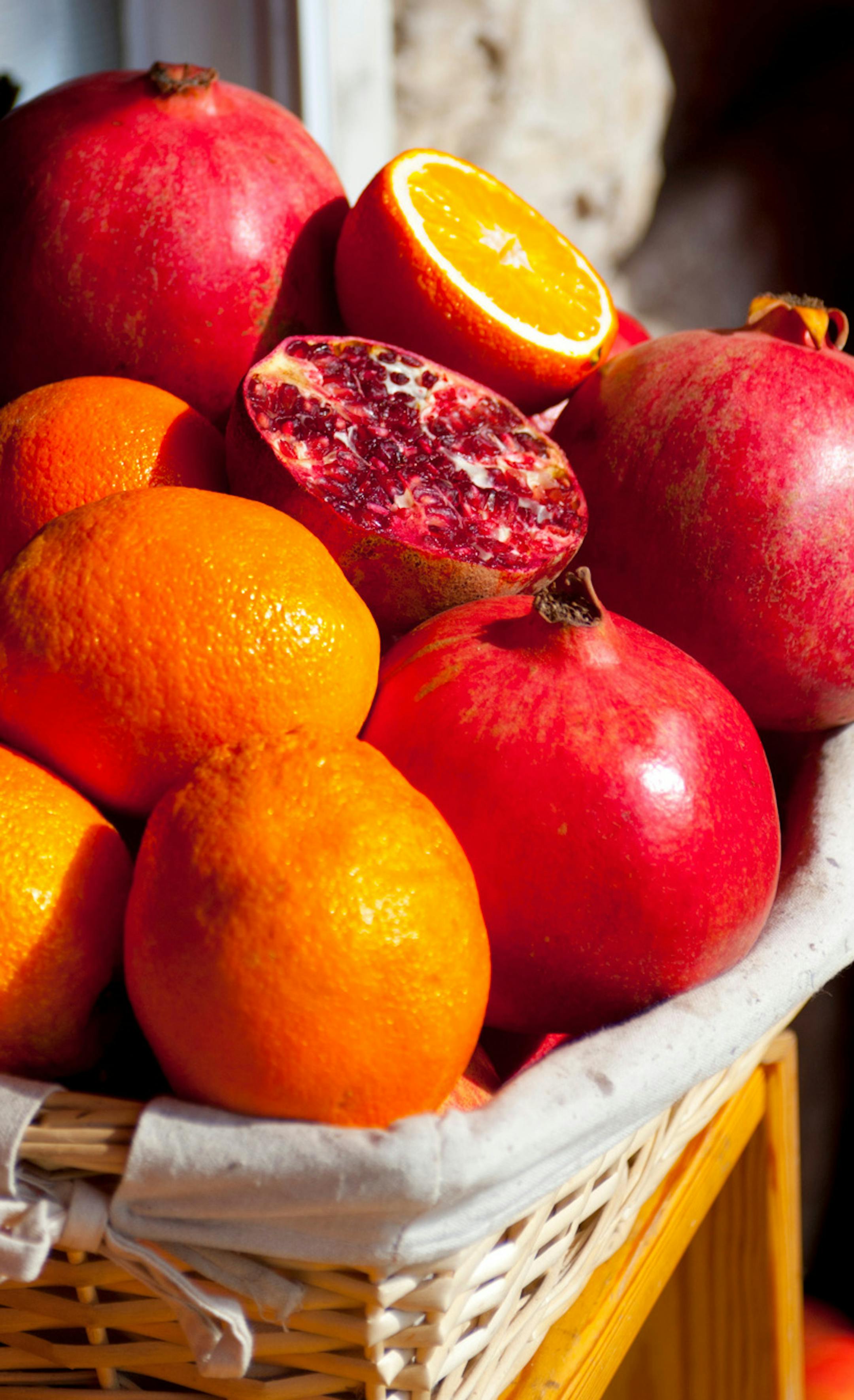 Israel Jerusalem village of Ein Karem - fruit pomegranates oranges and bananas for sale at a market
