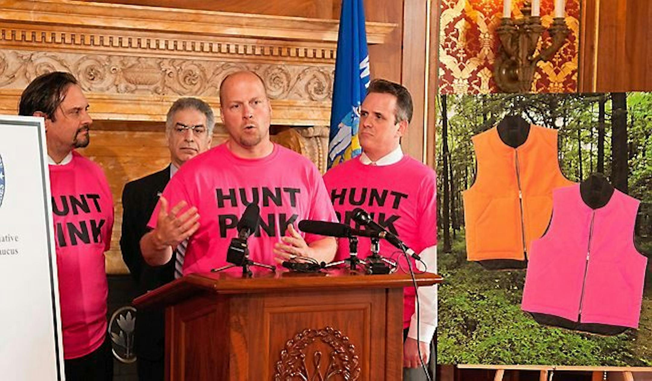 Wisconsin state Reps. Nick Milroy, center, Joel Kleefisch, left, and David Steffen, right, unveiled the bill to legalize pink apparel for hunters in 2015. All three lawmakers wore fluorescent pink T-shirts emblazoned with the message "Hunt Pink."
