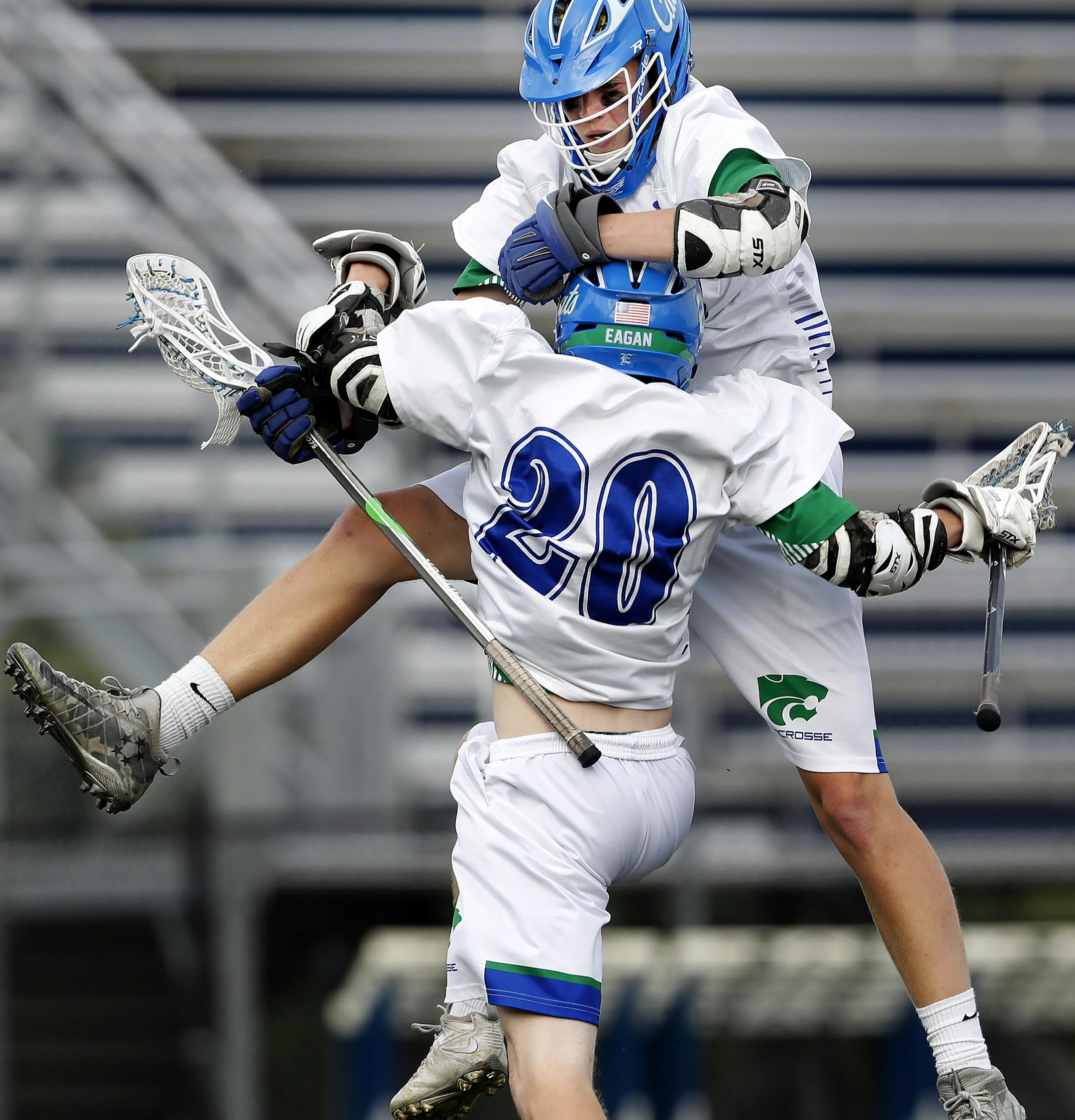 Aaron Propson (20) of Eagan celebrated with Darby Sorensen (3) after scoring in the second quarter. ] CARLOS GONZALEZ ï cgonzalez@startribune.com - June 13, 2017, Chanhassen, MN, Chanhassen High School, boys lacrosse state quarterfinals, Lakeville North vs. Eagan