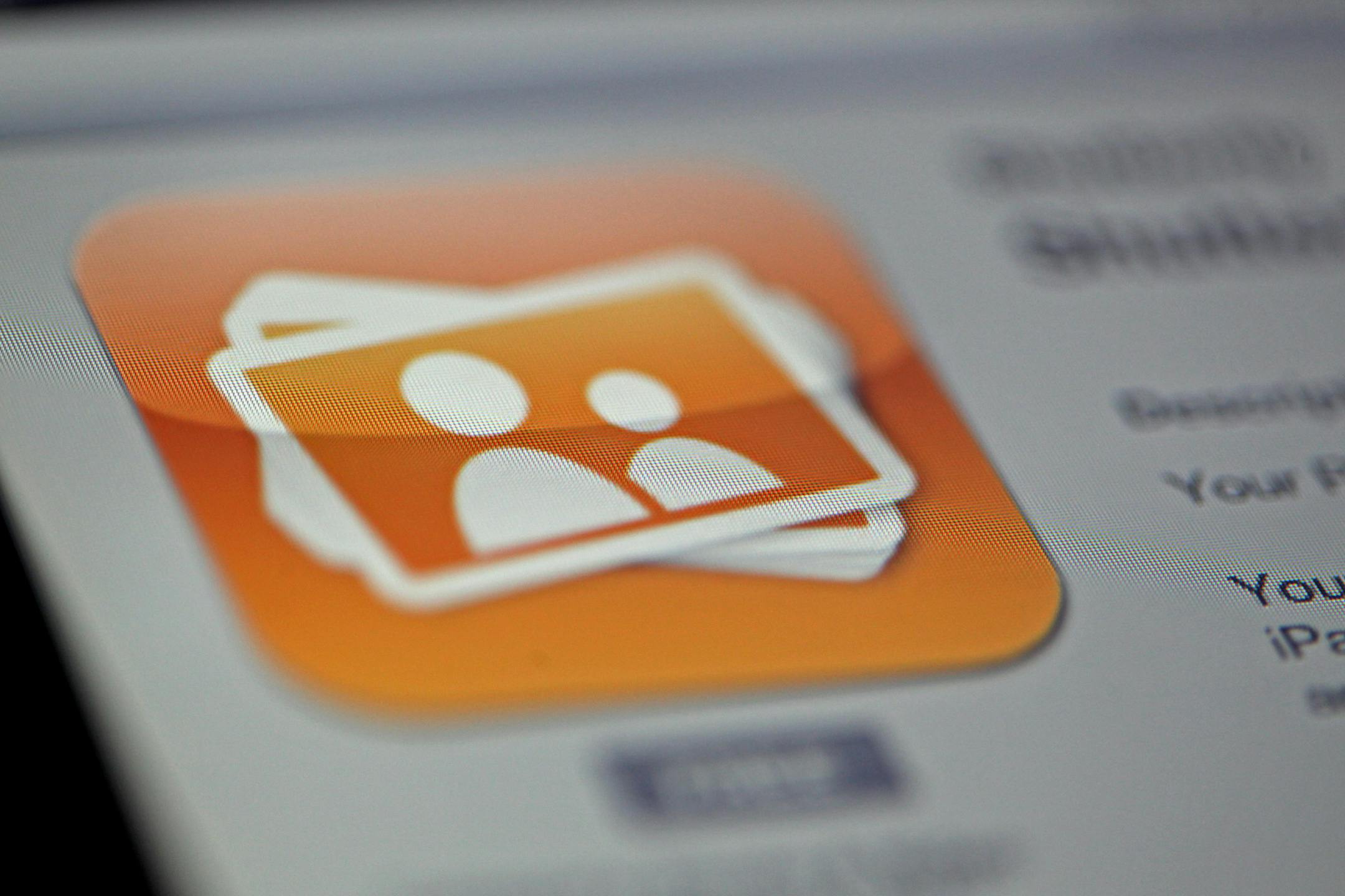 The Shutterfly Inc. app logo is displayed on an Apple Inc. iPad in Des Plaines, Illinois, U.S., on Tuesday, Feb. 5, 2013. Shutterfly Inc. soared the most in more than three years after forecasting 2013 sales that were higher than analysts estimated as marketing and mobile tools help the online photo-sharing service expand its customer base. Photographer: Tim Boyle/Bloomberg