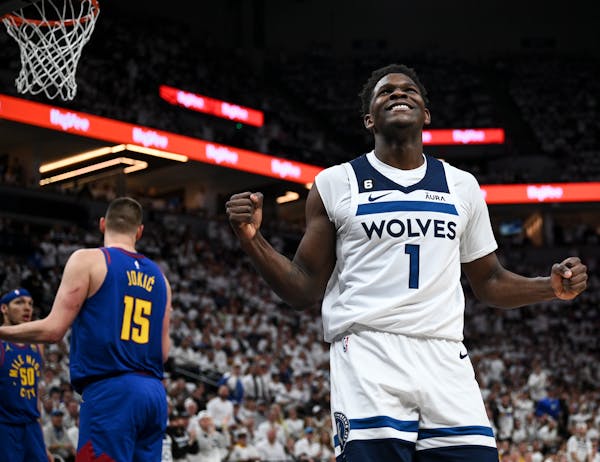 Minnesota Timberwolves guard Anthony Edwards (1) reacts after he was unable to finish during an and-one opportunity in the first quarter against the D