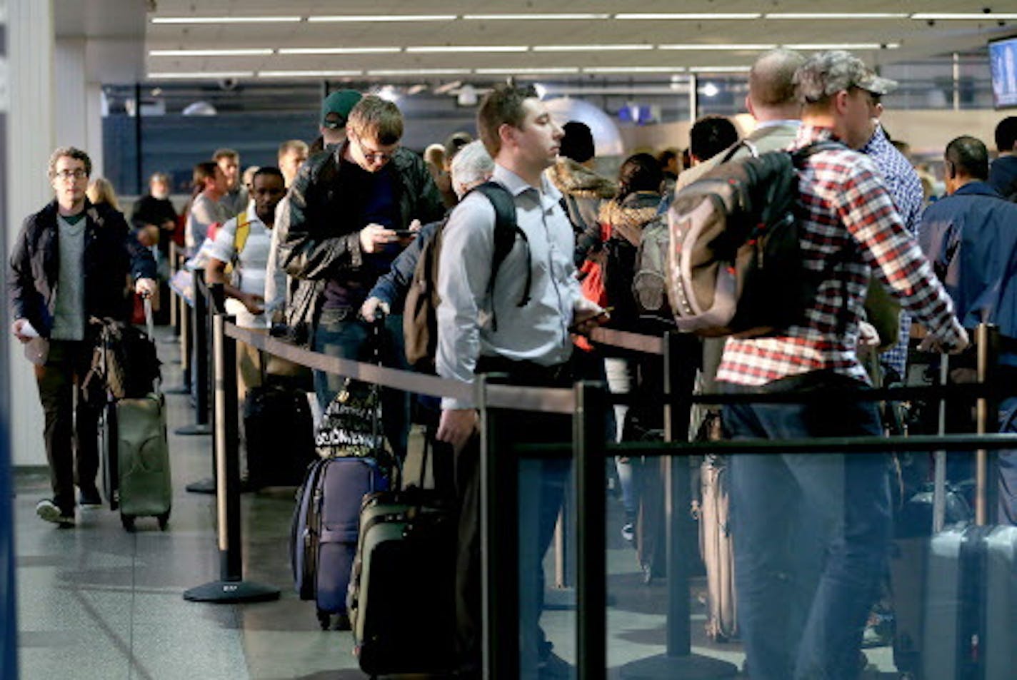 Travelers stood in the TSA screening line at MSP Airport in November.