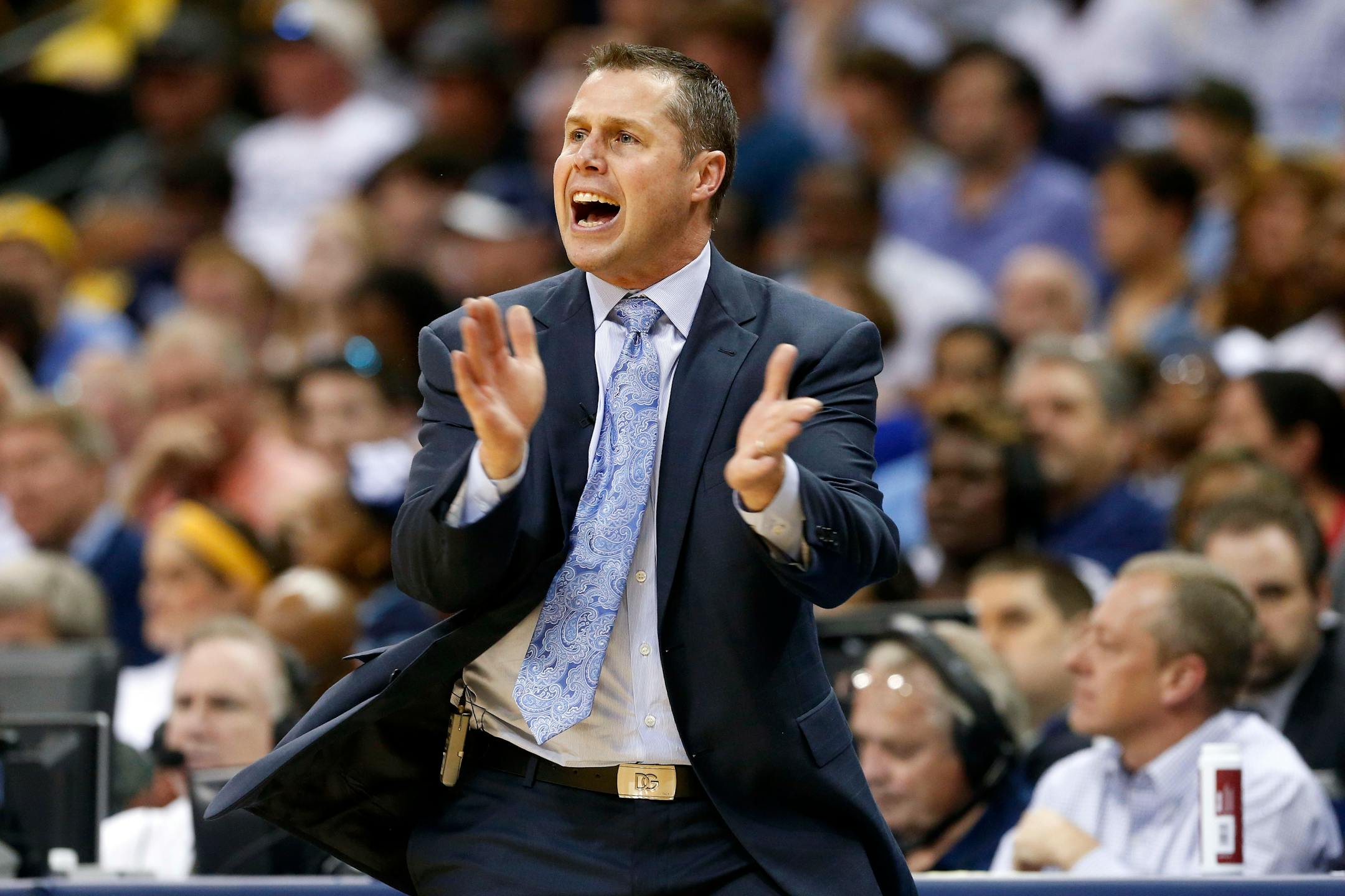 Memphis Grizzlies head coach David Joerger yells to his players in the first half of Game 6 of an opening-round NBA basketball playoff series against the Oklahoma City Thunder, Thursday, May 1, 2014, in Memphis, Tenn. (AP Photo/Mark Humphrey)