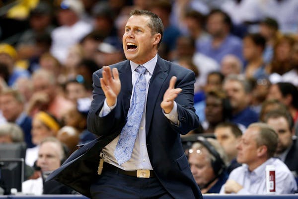Memphis Grizzlies head coach David Joerger yells to his players in the first half of Game 6 of an opening-round NBA basketball playoff series against 