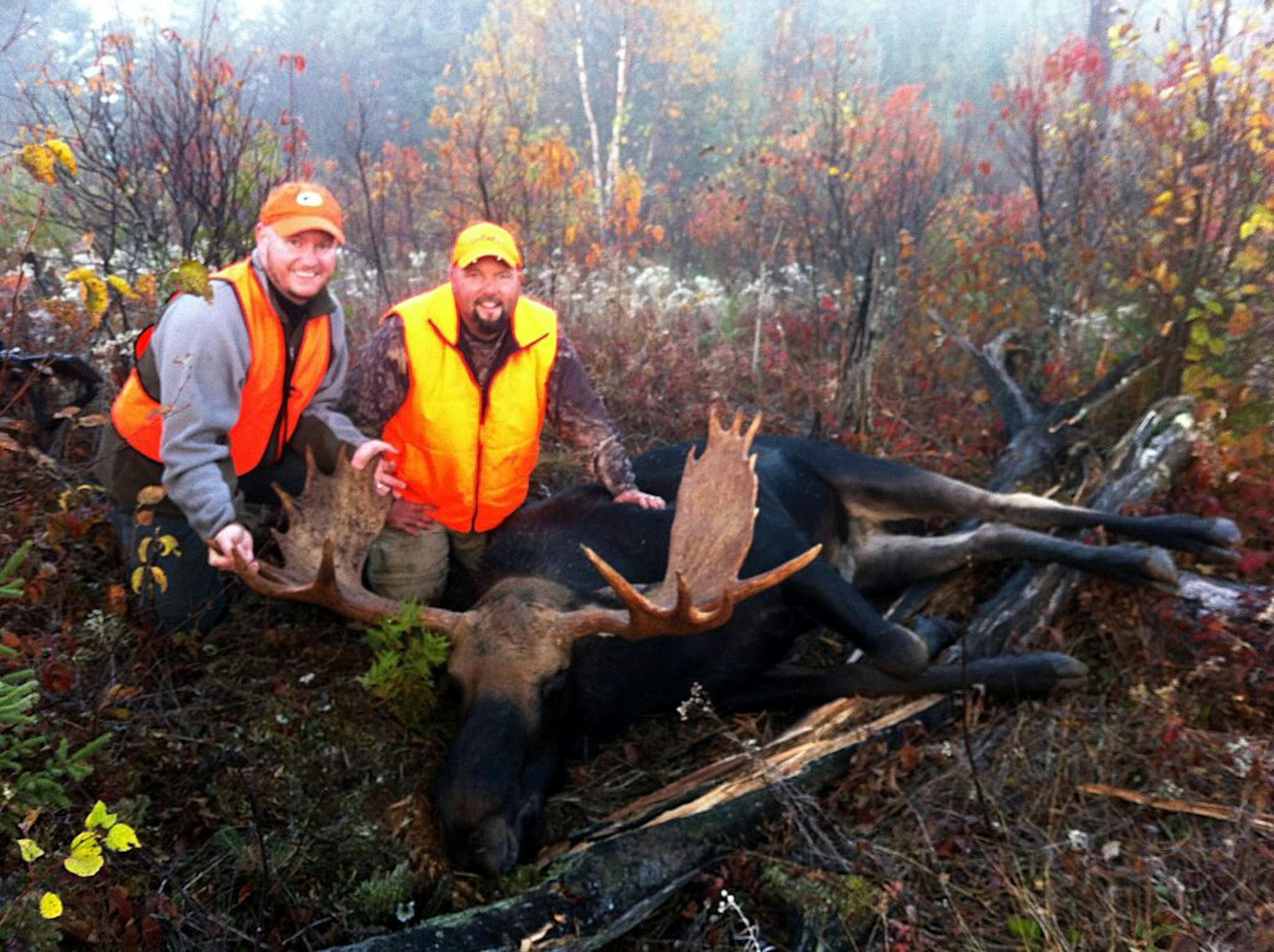 Brian Mastel, of Greenfield, and Colby Smith of Corcoran, with a bull moose that Smith shot in the BWCA last month. Also along on the trip was Smith's brother, Taylor, also of Corcoran. The bull's rack measured 49 3/4 inches. Photo courtsey Taylor Smith.