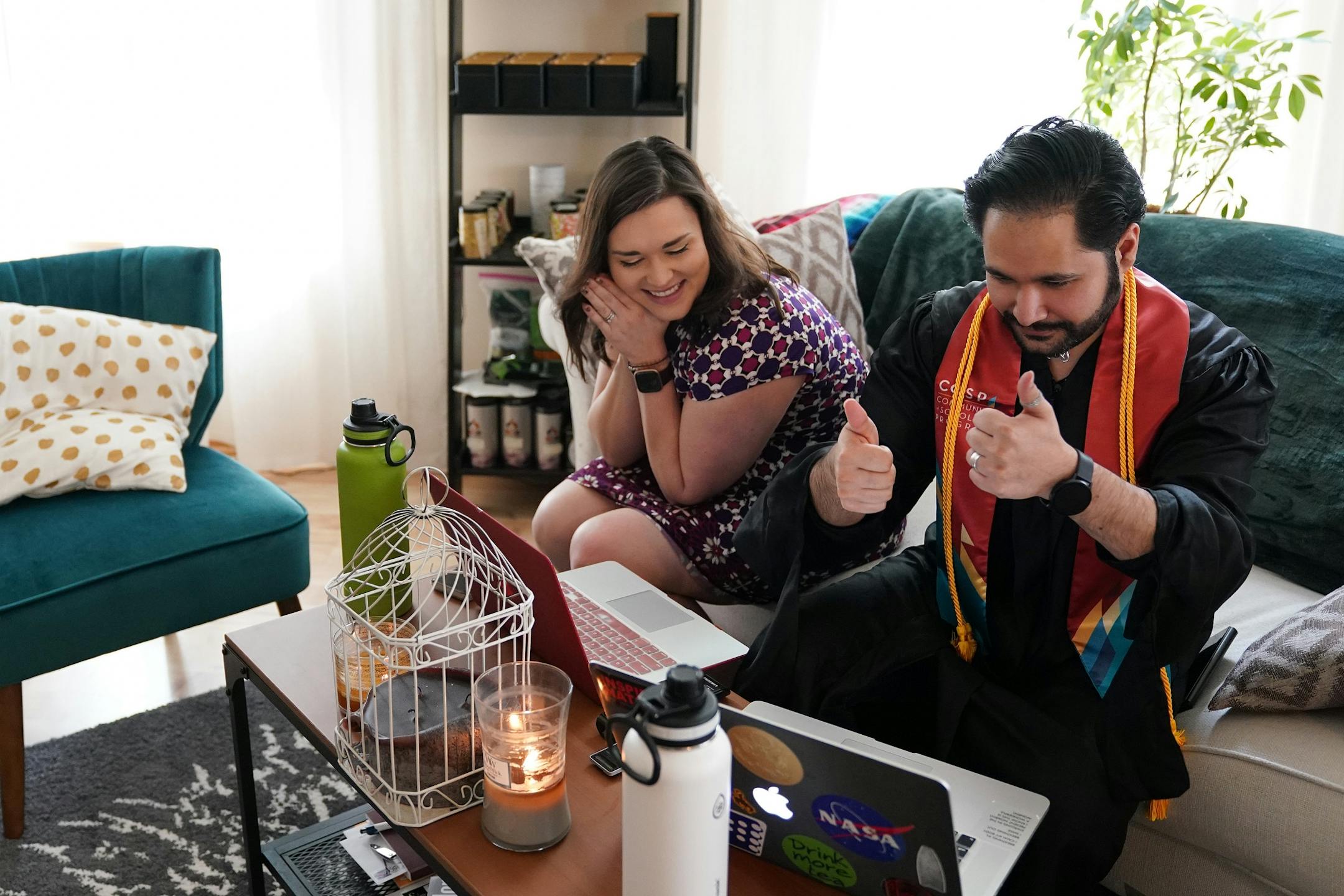 Izaak Mendoza talked online with his mother after watching the video commencement address in his graduation robes alongside his wife Becky and the rest of his family who were on a video call from their home in Wyoming Saturday.