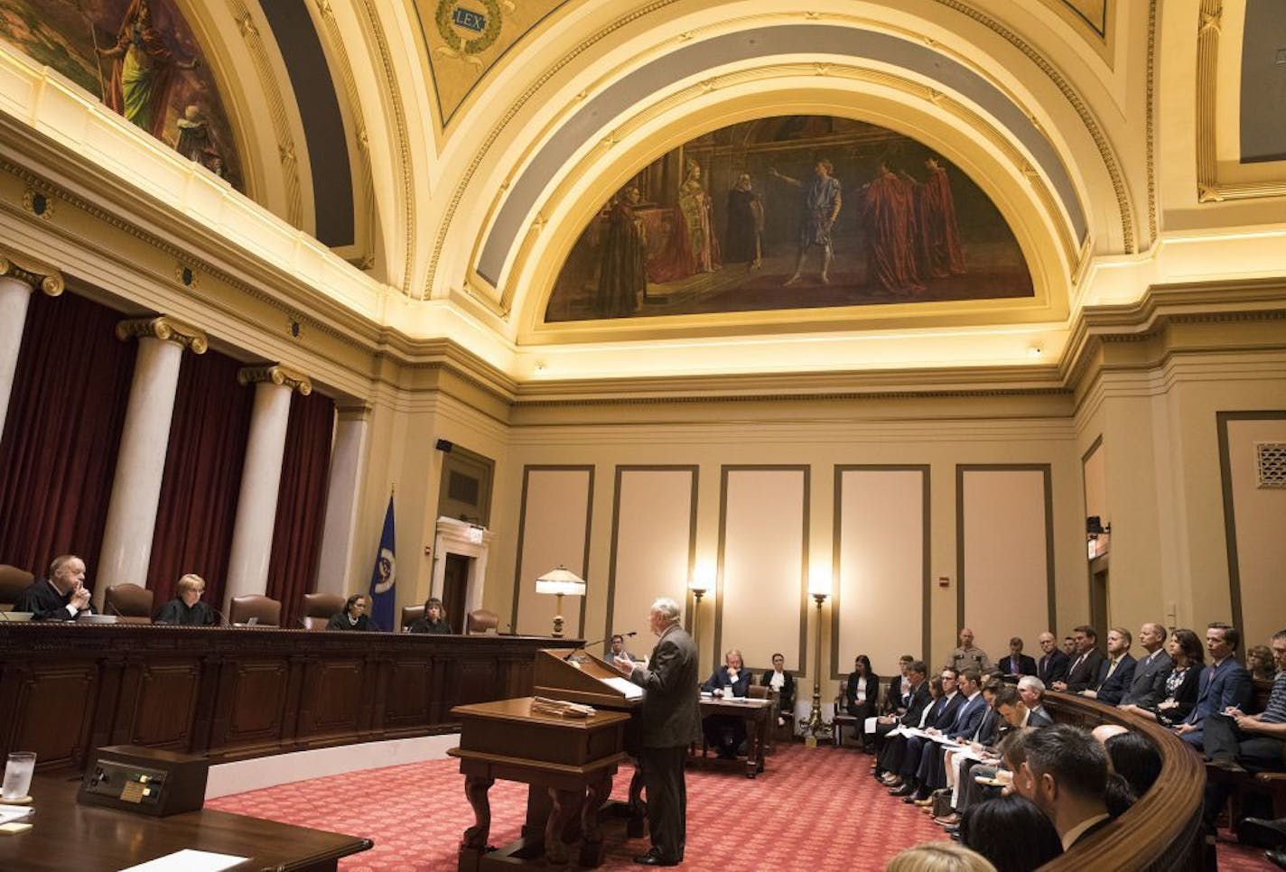 Sam Hanson, the attorney representing Gov. Mark Dayton, delivers his oral arguments before the Minnesota Supreme Court at the Capitol in St. Paul, Minn., Monday, Aug. 28, 2017, in the appeals case after the governor's attempt to eliminate funding for the Minnesota Legislature resulted in the Legislature suing him. (Leila Navidi/Star Tribune via AP) ORG XMIT: MIN2017082914125740 ORG XMIT: MIN1708291416263764