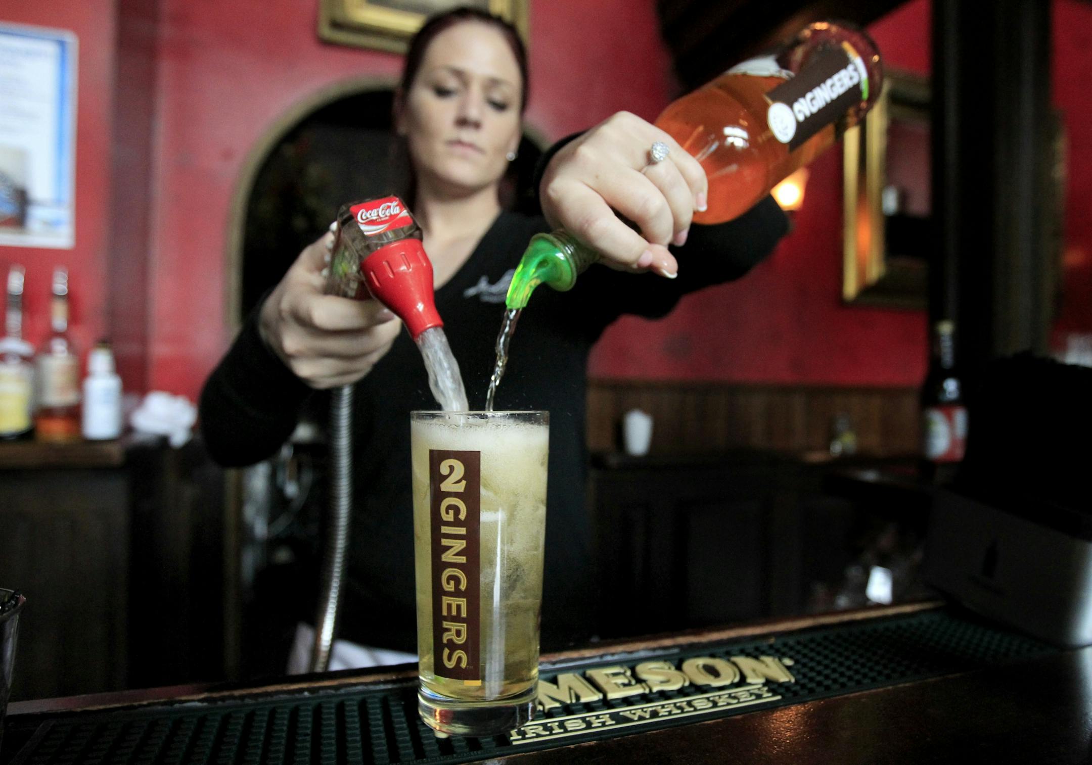 Bartender Elle Maeyaert poured a "Big Ginger" at The Local in downtown Minneapolis on Wednesday.