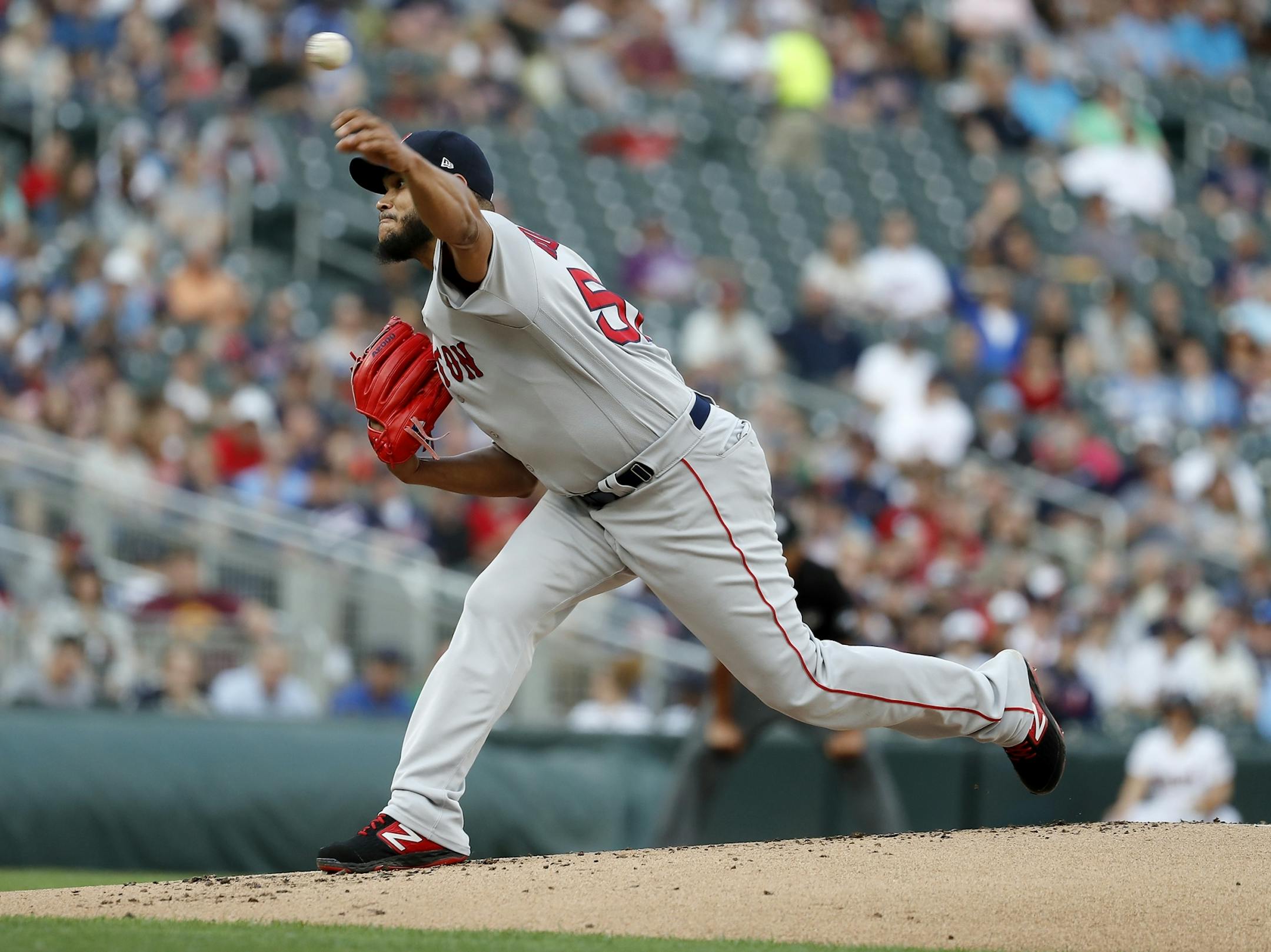 Boston Red Sox starting pitcher Eduardo Rodriguez (57) pitches in the first inning.