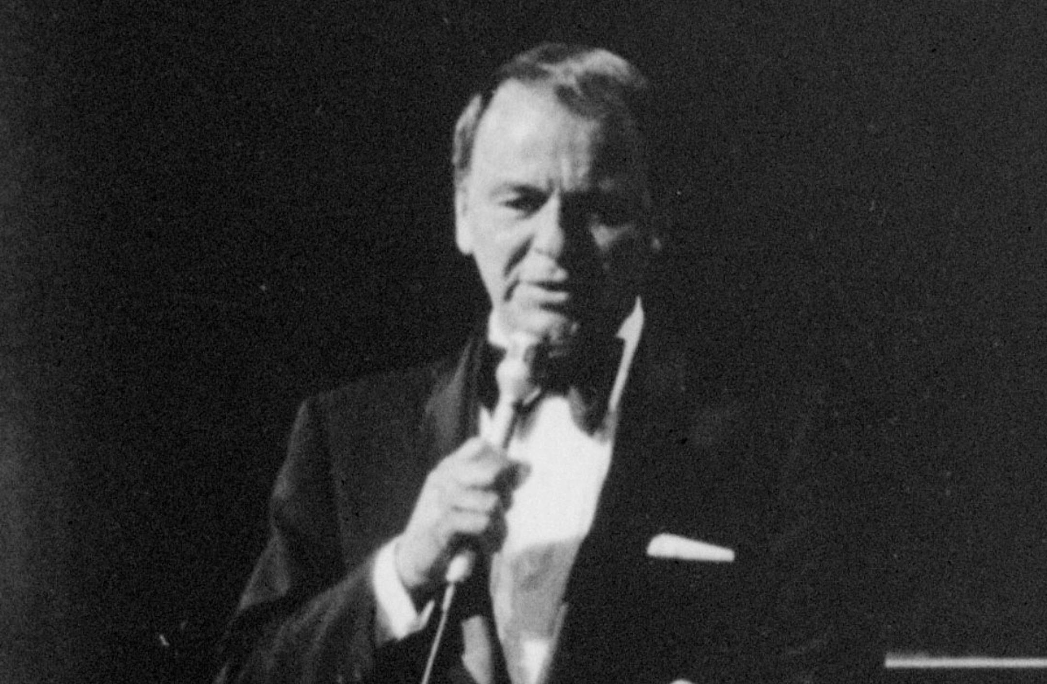 Frank Sinatra sings from the stage of the Los Angeles Music Center Pavilion, June 14, 1971, during the Motion Picture and Television Relief Fund gala in what was billed as his final appearance in public. (AP Photo)