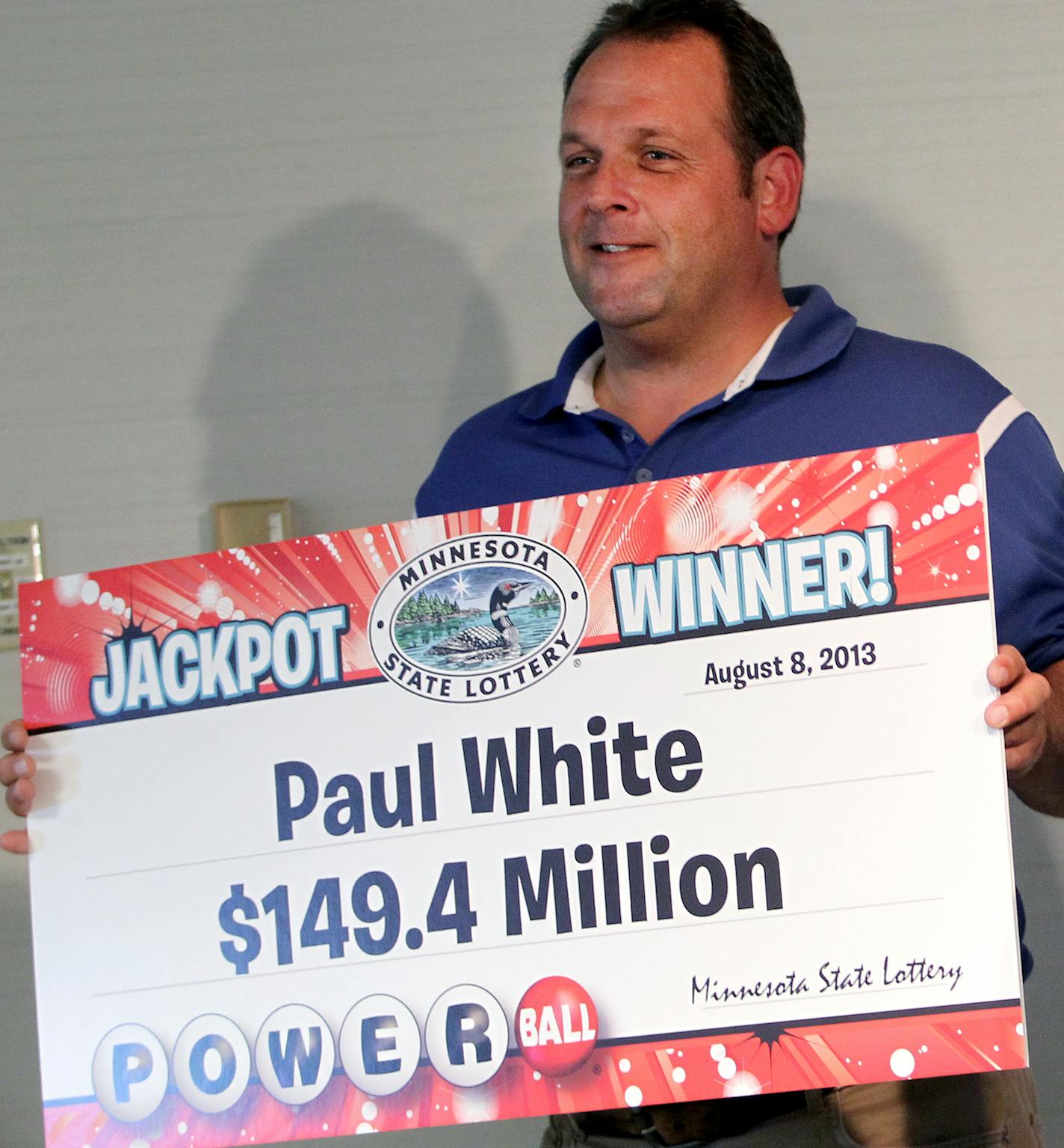 Paul White, of Ham Lake, claims a $149.4 million Powerball jackpot at the Minnesota State Lottery office in Roseville, Minn., on Thursday, August 8, 2013. ] (ANNA REED/STAR TRIBUNE) anna.reed@startribune.com (cq)