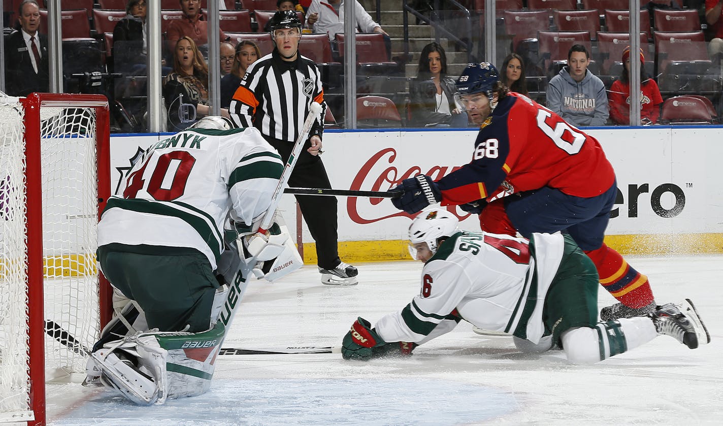 Florida Panthers forward Jaromir Jagr (68) scores a goal past Minnesota Wild&#xed;s goaltender Devan Dubnyk (40) during the first period of an NHL hockey game, Sunday, Jan. 3, 2016, in Sunrise, Fla. (AP Photo/Joel Auerbach)