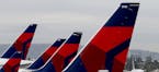Delta Airlines aircraft are lined up at Terminal 5 in Los Angeles International Airport on December 21, 2016. (Luis Sinco/Los Angeles Times/TNS) ORG X