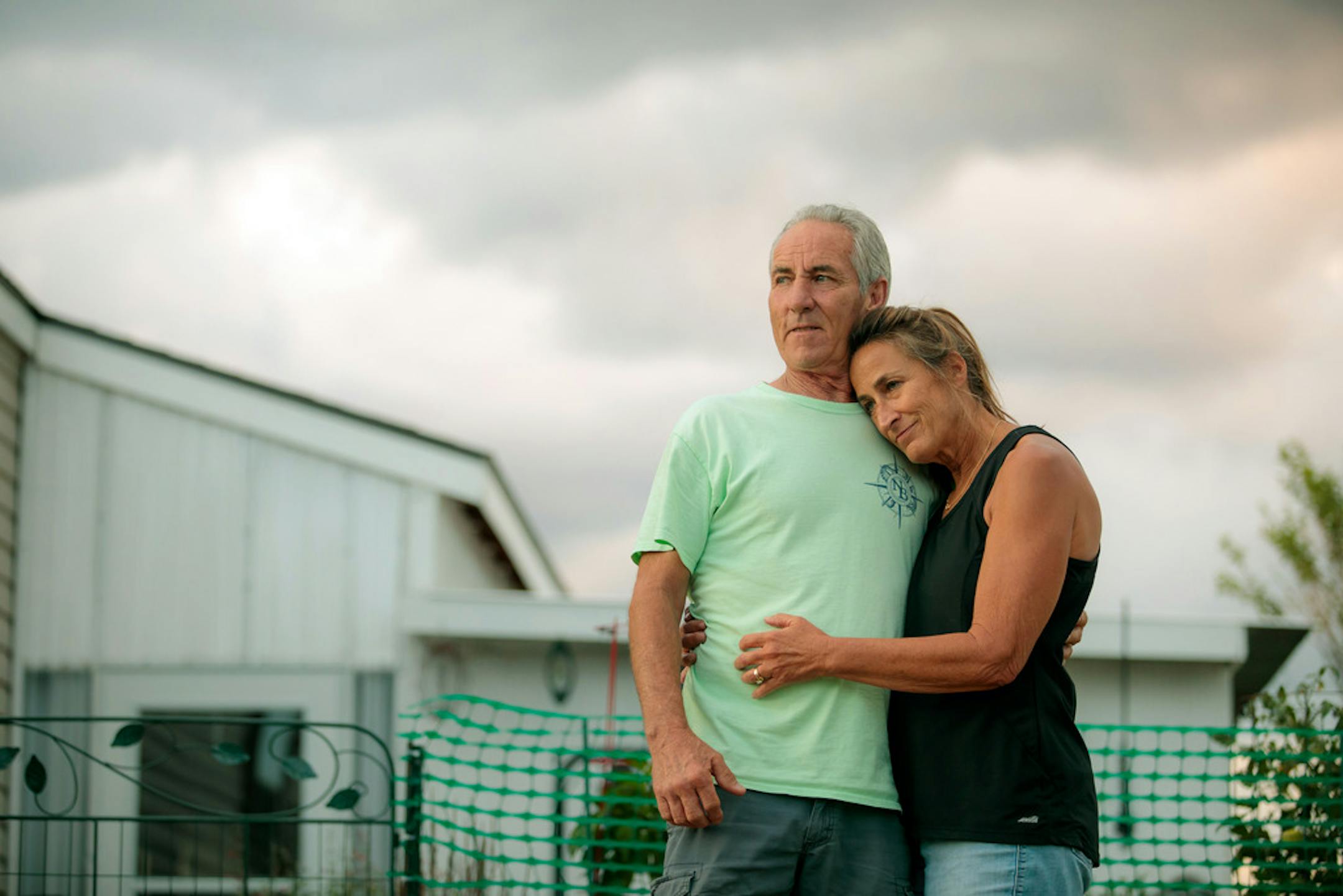 Dee Dee Patten and her husband, Dana, at their new home in Evans, Colo., on June 29, 2021. They decided to retire early when the pandemic upended their business. (Matthew Staver/The New York Times)
